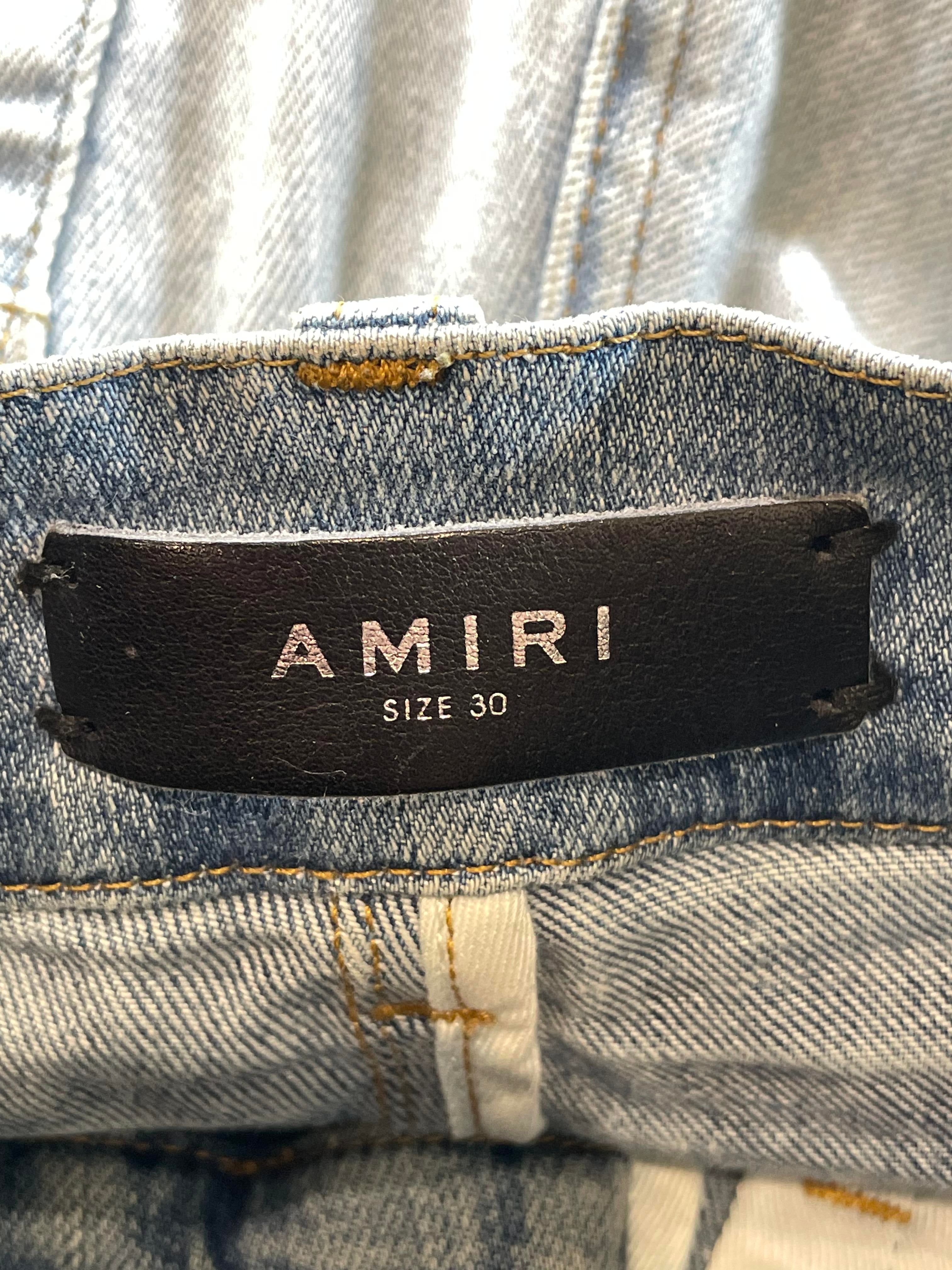 Amiri Paint Splatter Light Wash Knee Rip Jeans