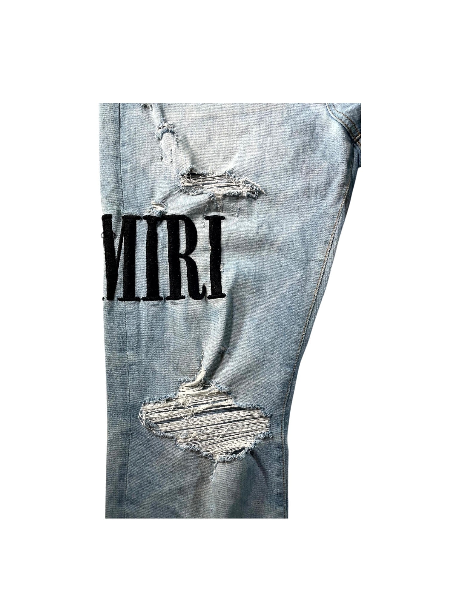 Amiri Embroidered Side Logo Light Wash & Black Jeans