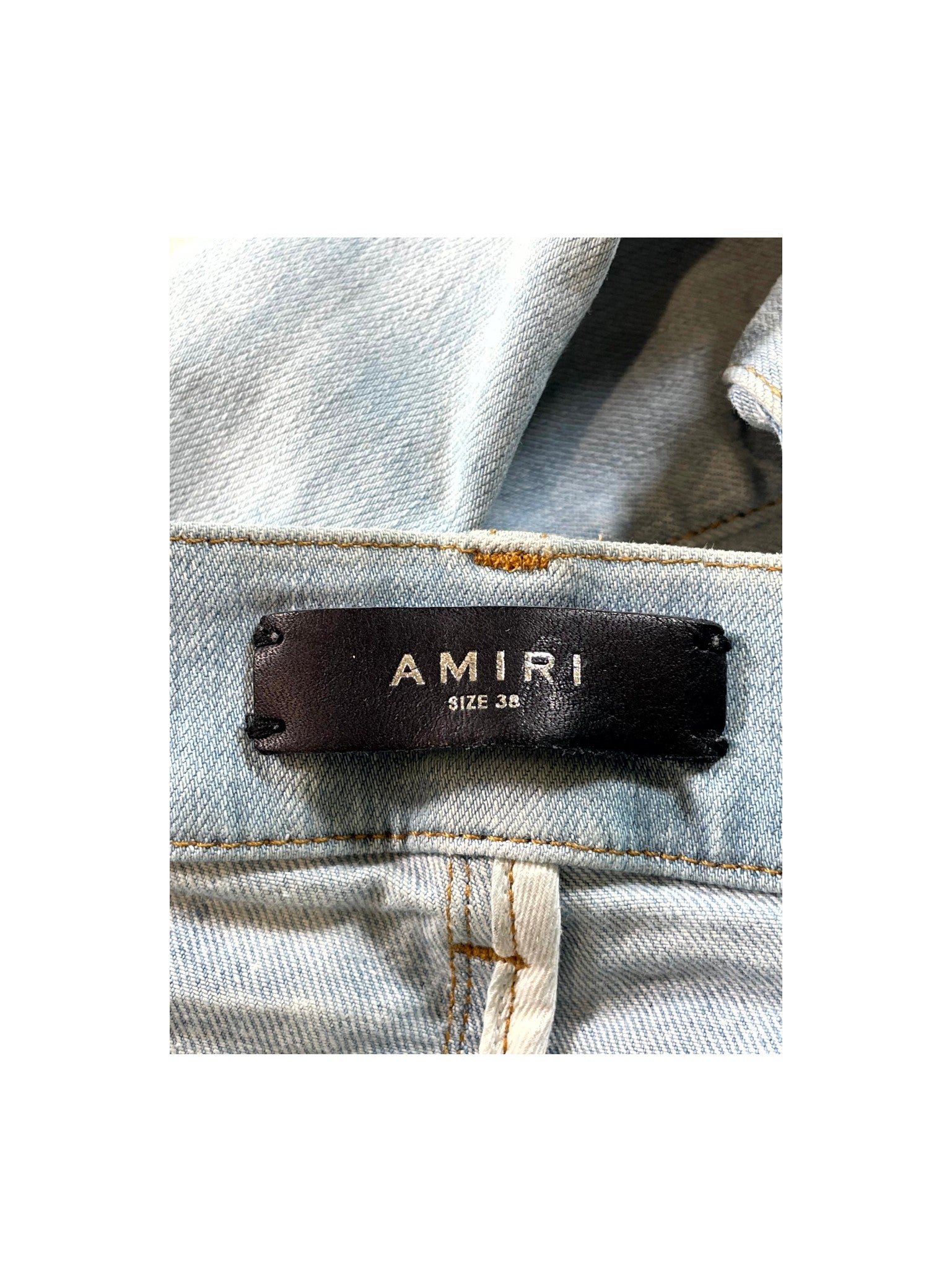 Amiri Embroidered Side Logo Light Wash & Black Jeans