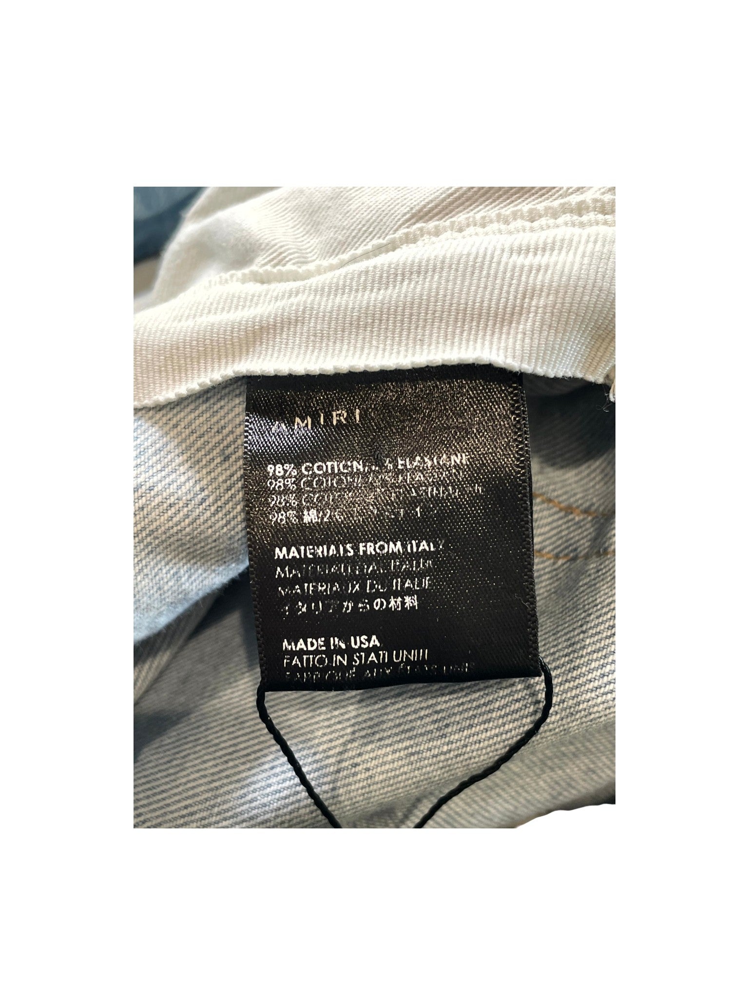 Amiri Embroidered Side Logo Light Wash & Black Jeans