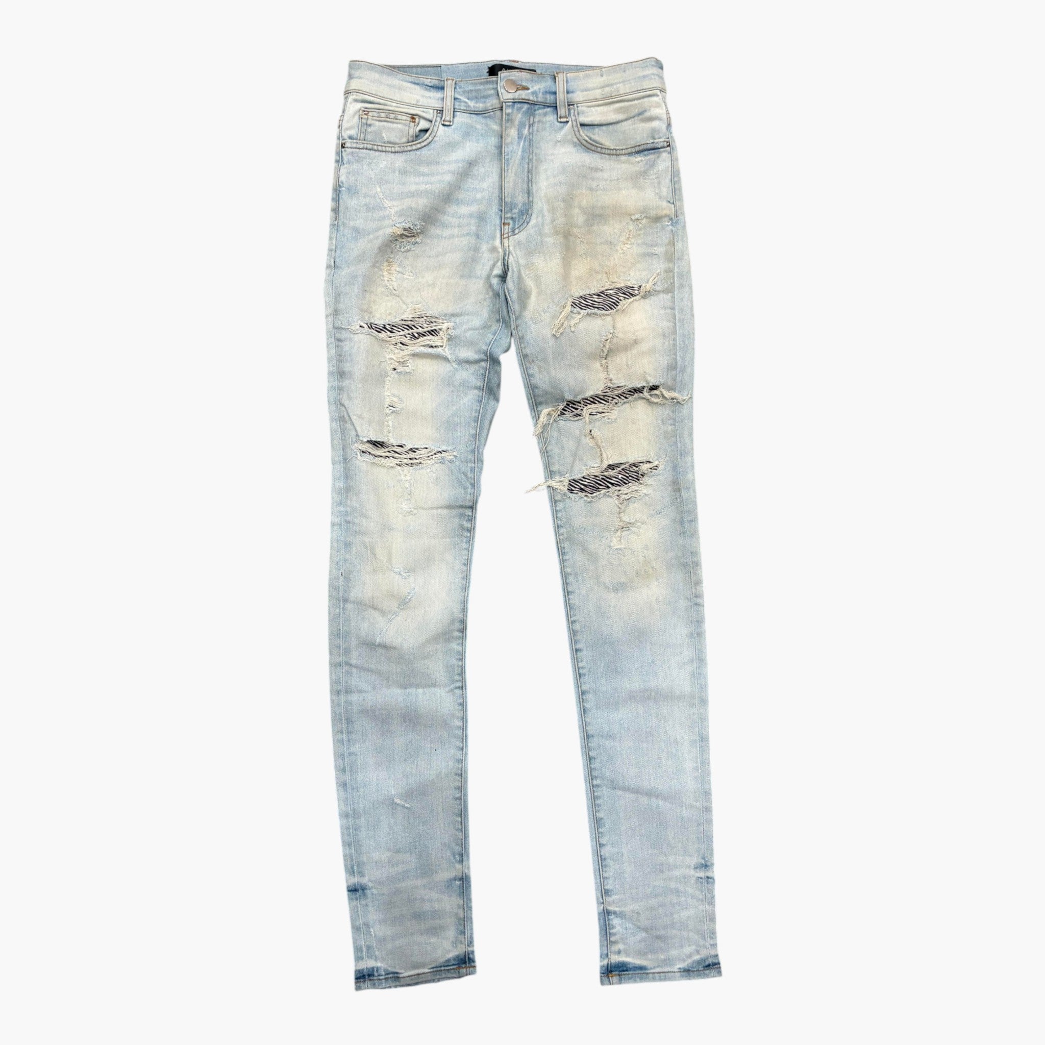 Amiri Ripped Thrasher Jeans