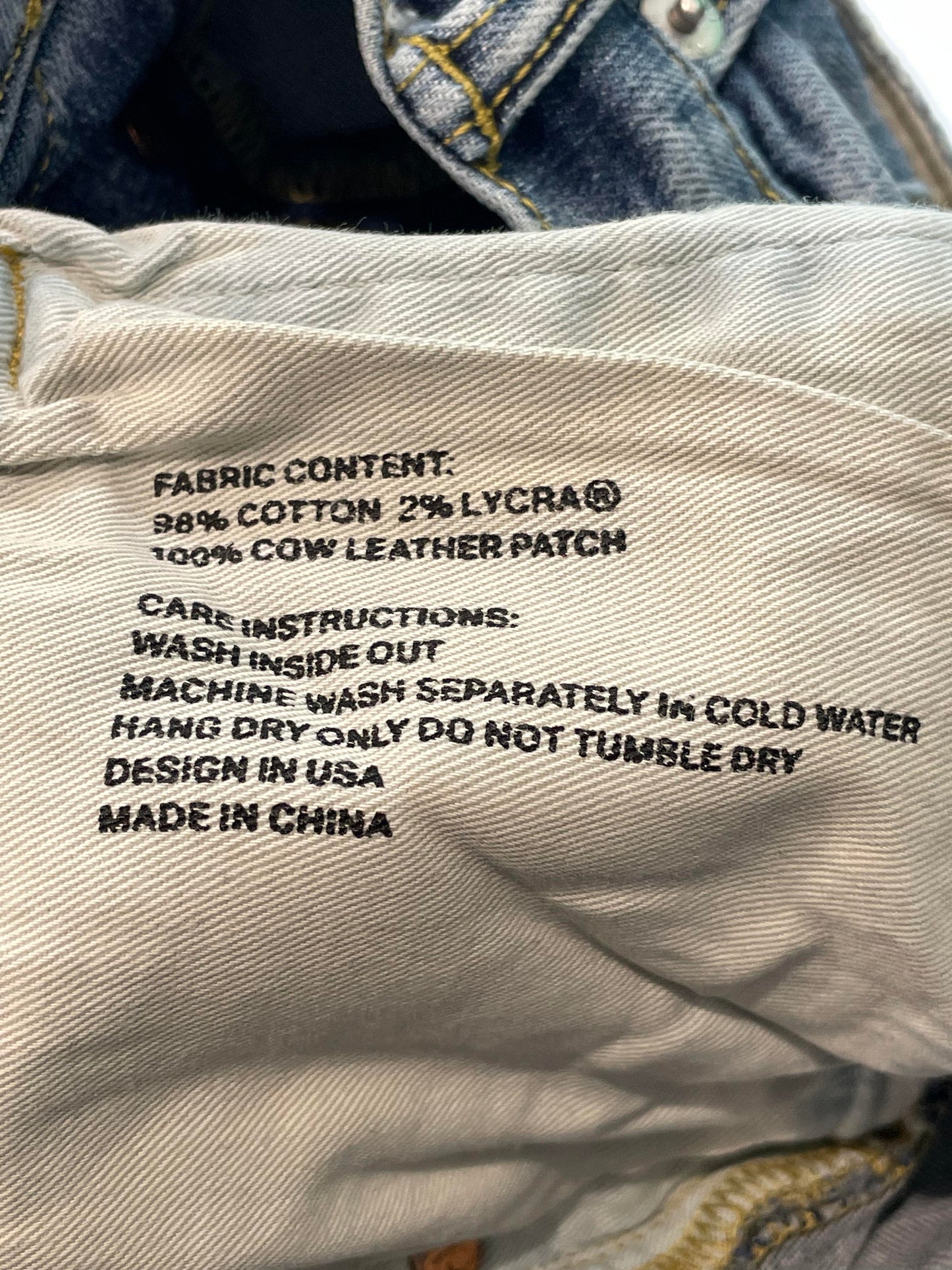 Purple Brand Light Wash Ripped Jeans
