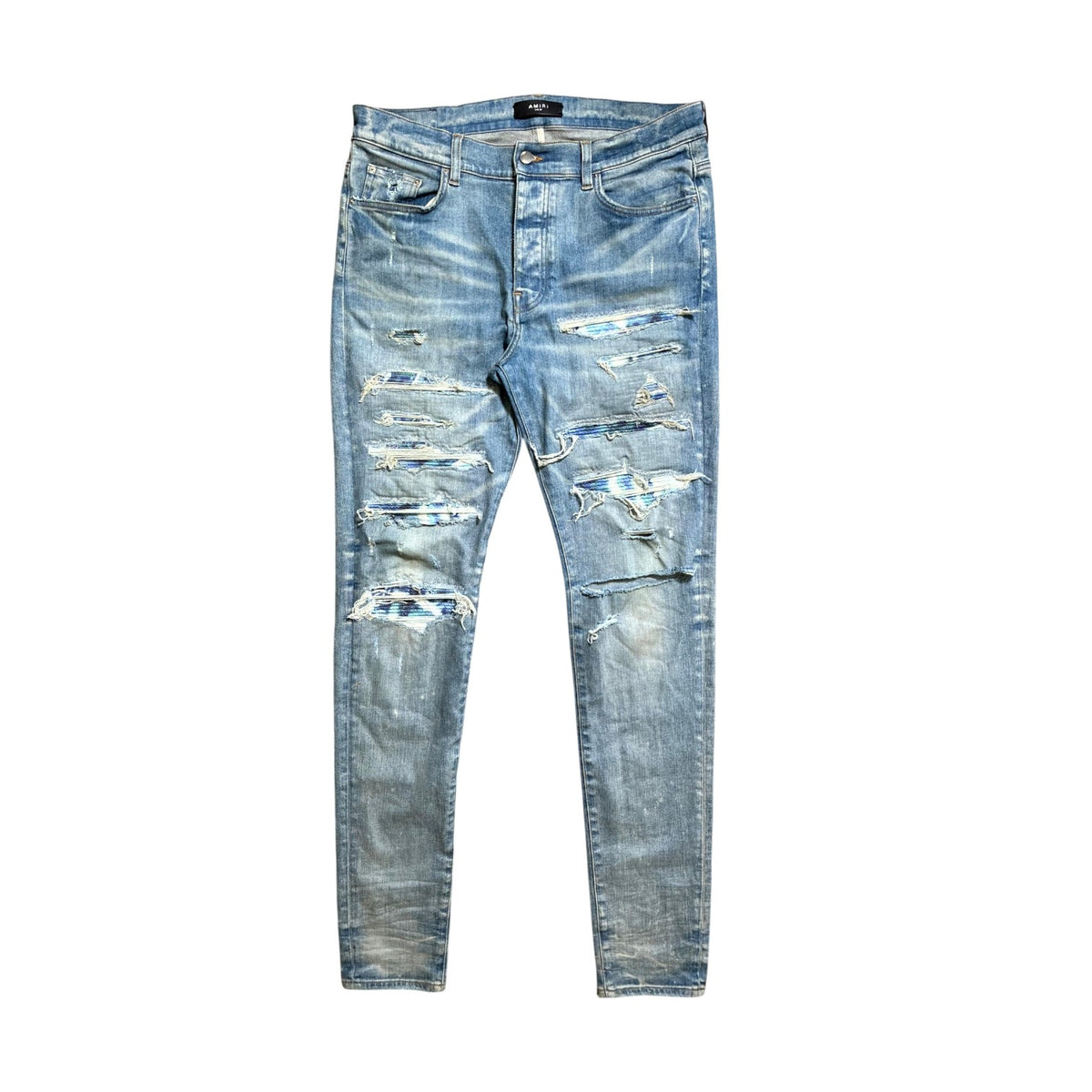 Amiri Honeycomb Tie Dye Thrasher Patch Light Wash Jeans