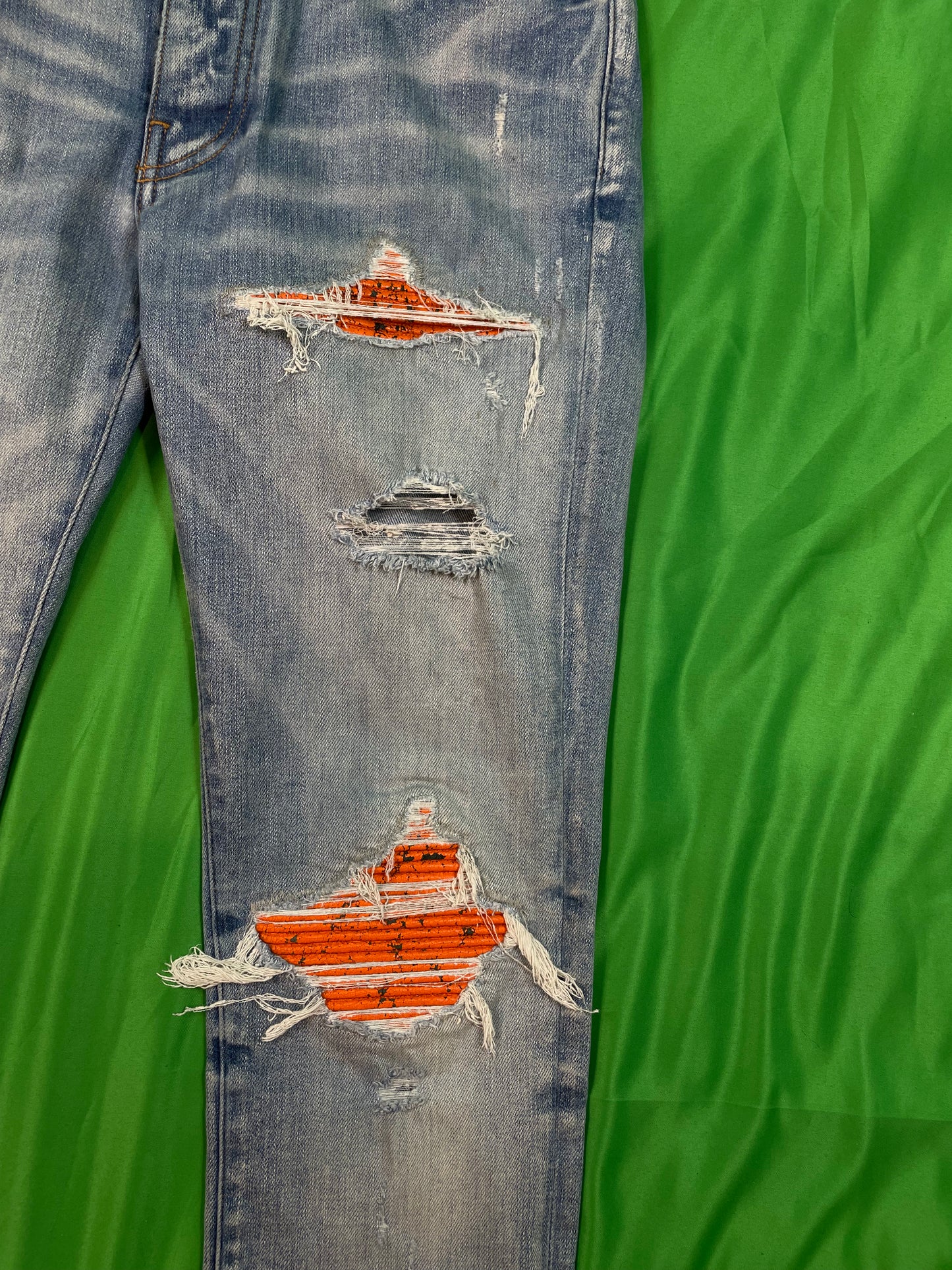 Amiri MX1 Orange Crackle Patch Light Wash Blue Jeans