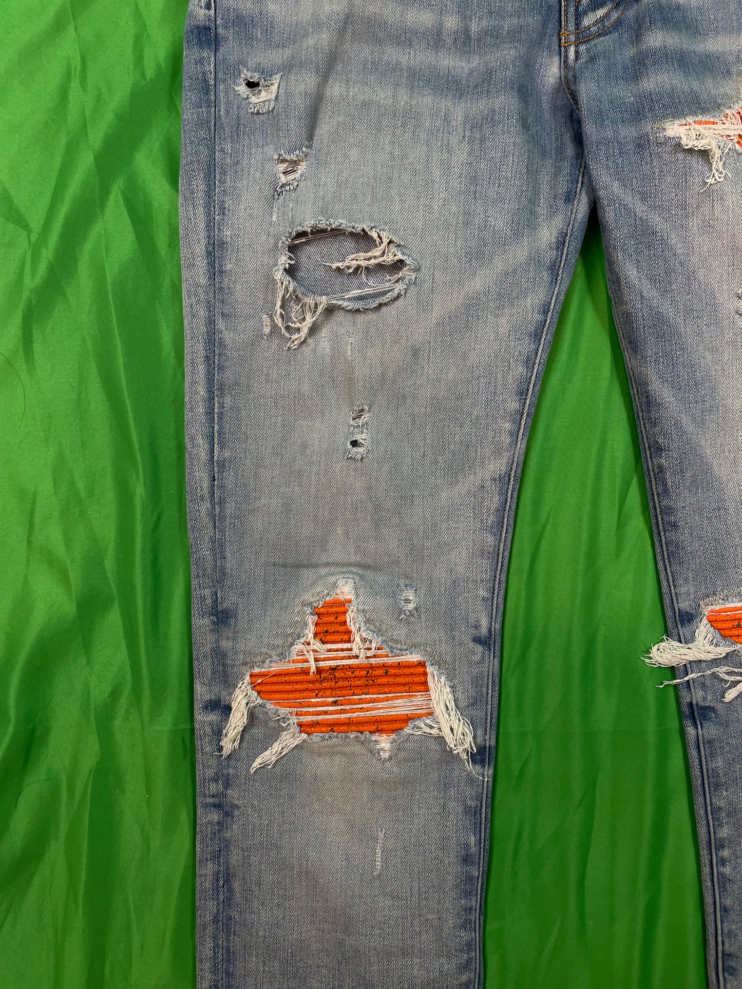 Amiri MX1 Orange Crackle Patch Light Wash Blue Jeans