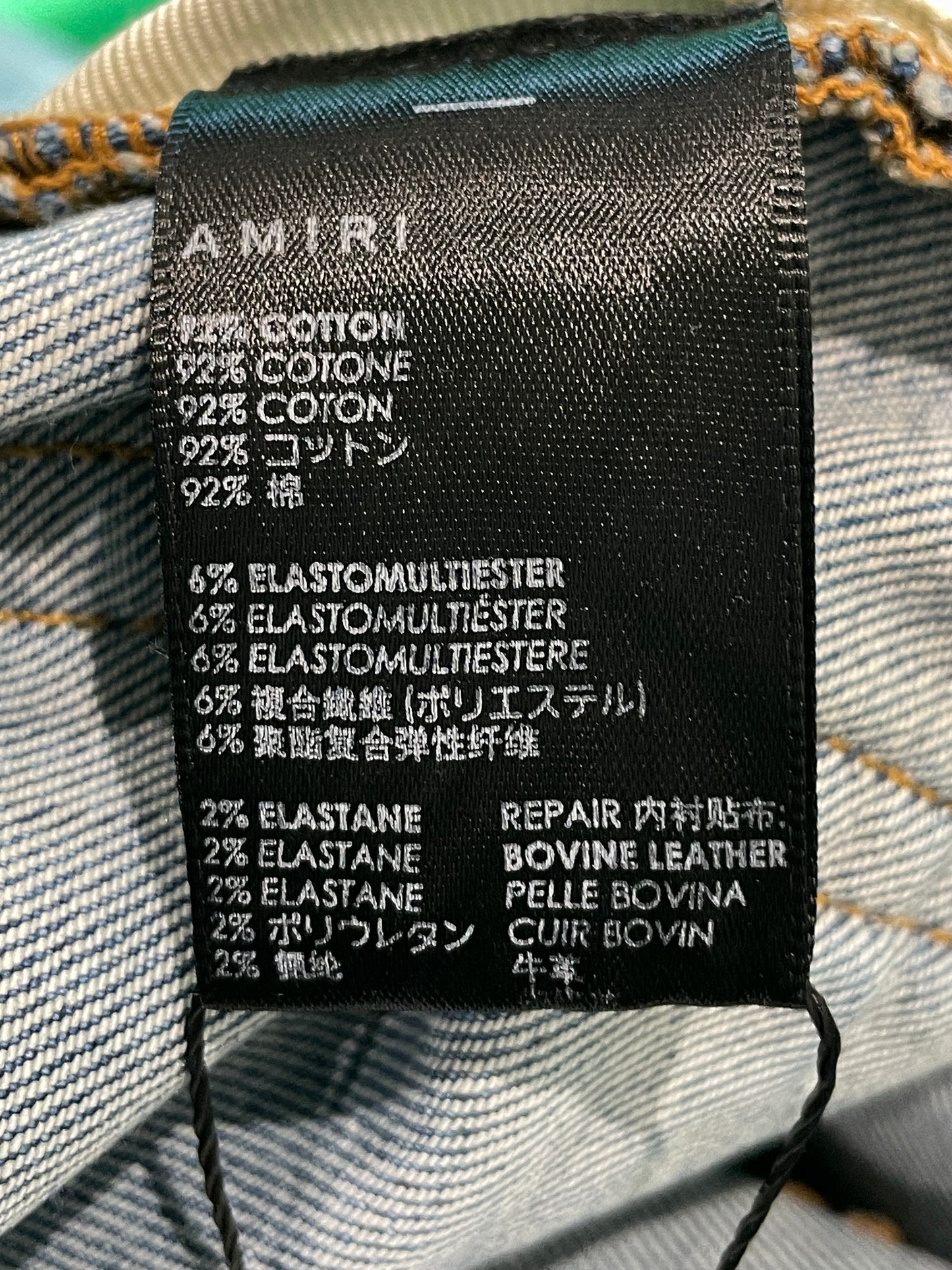 Amiri MX1 Orange Crackle Patch Light Wash Blue Jeans