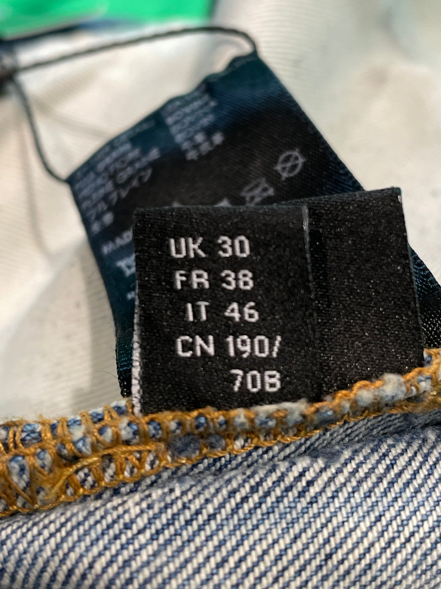 Amiri MX1 Orange Crackle Patch Light Wash Blue Jeans