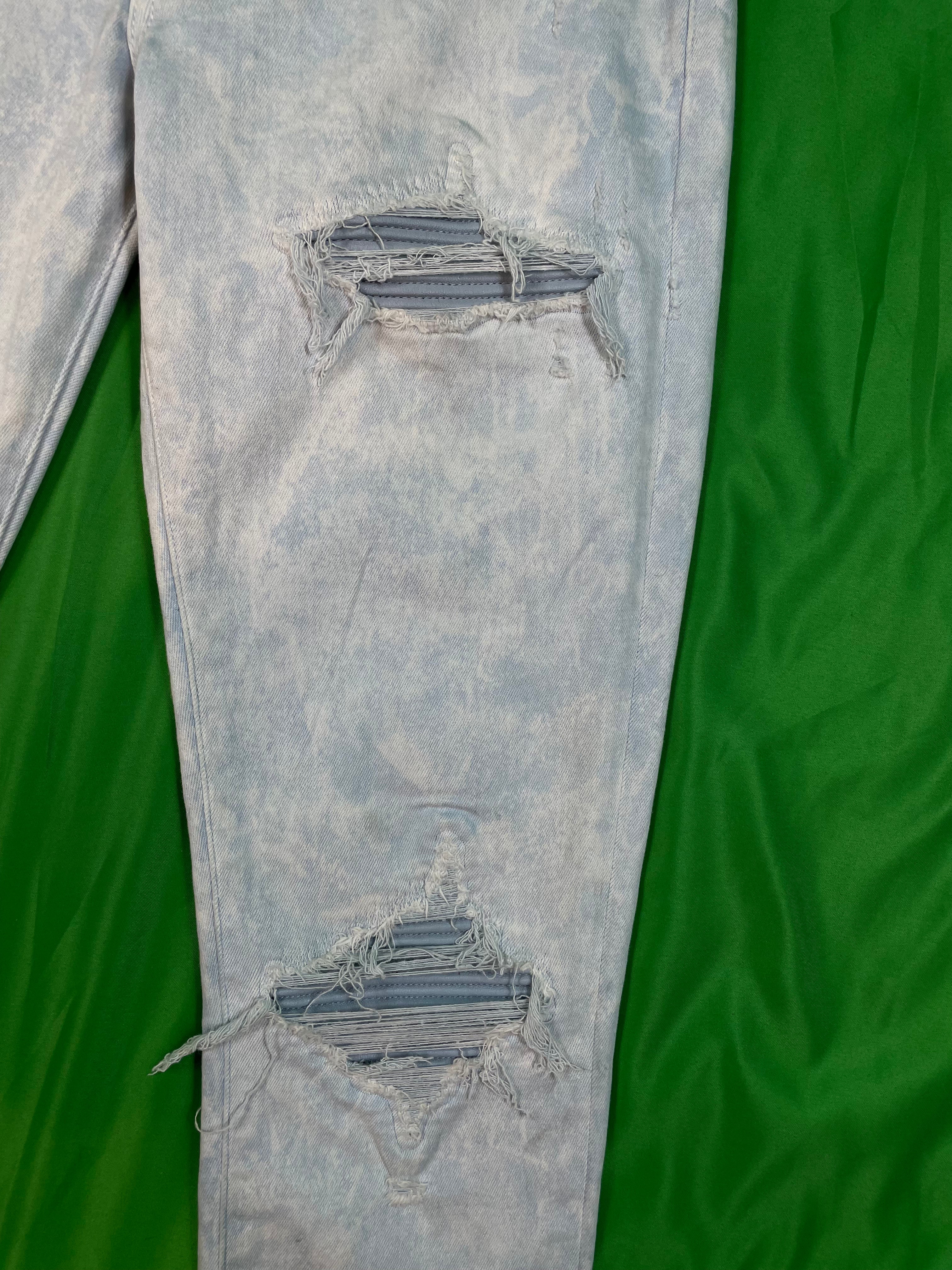 Amiri MX1 Ripped Powder Blue Jeans