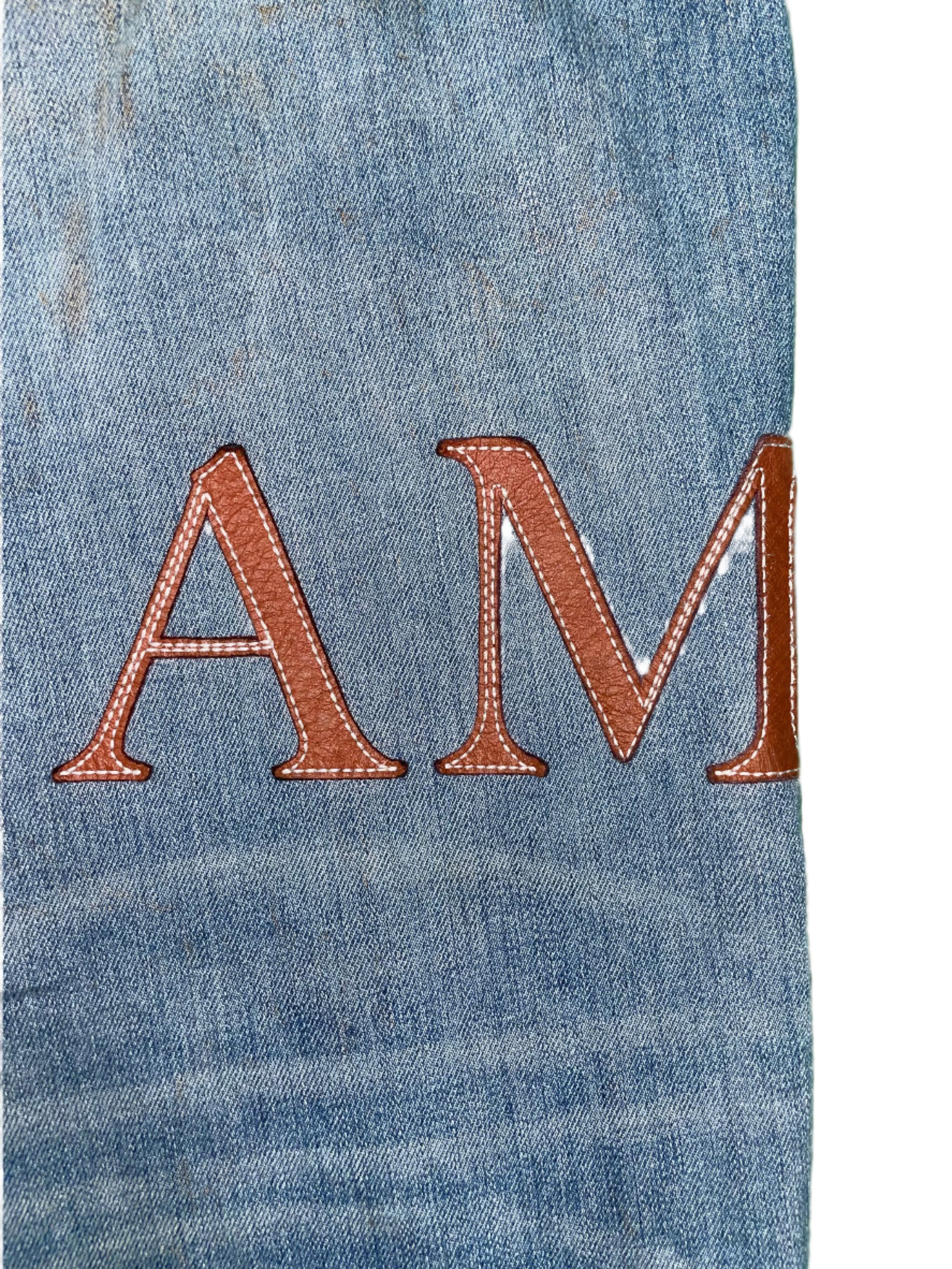 Amiri Clay Side Logo Light Wash Blue Jeans