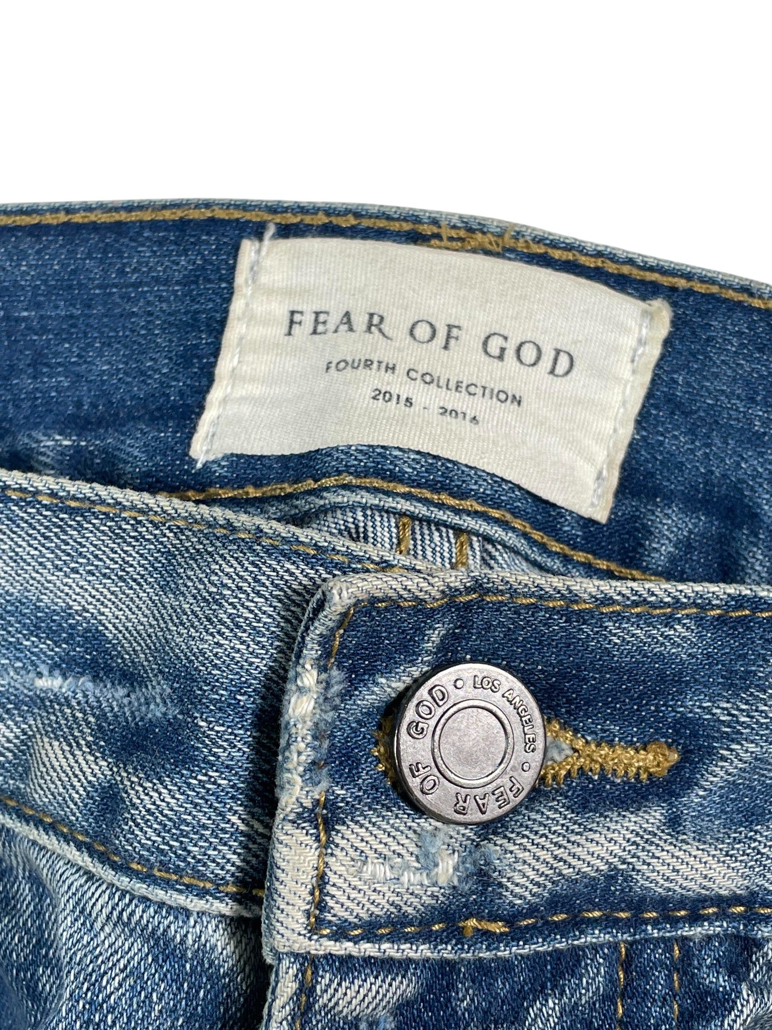 Fear of God Light Wash Ripped Jeans