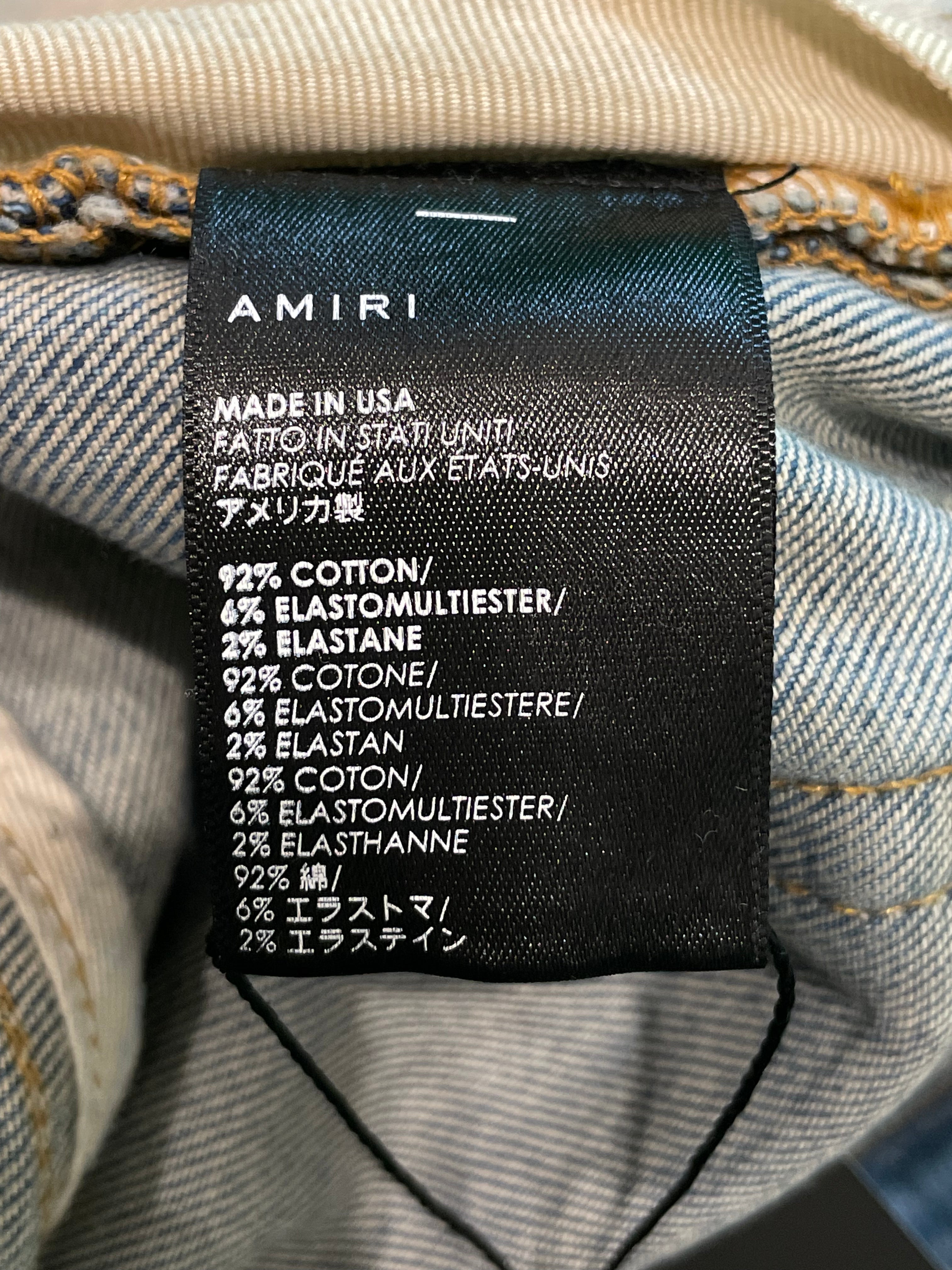 Amiri White Side Logo Light Wash Blue Jeans