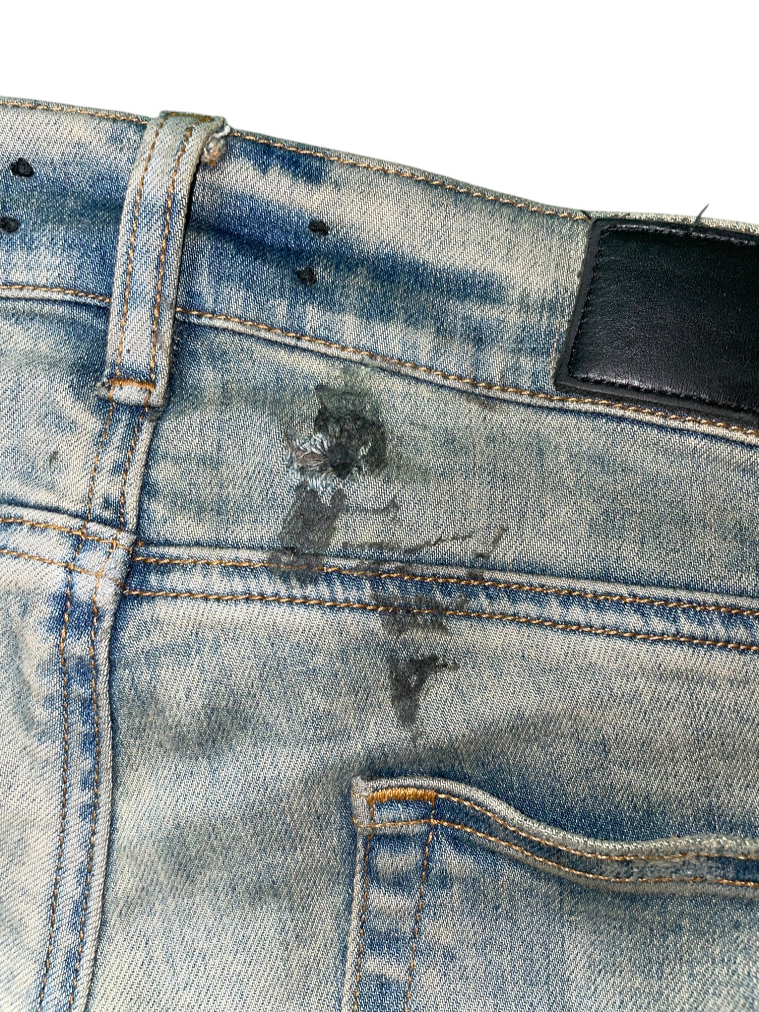 Amiri Knee Rip Vintage Wash Blue Jeans