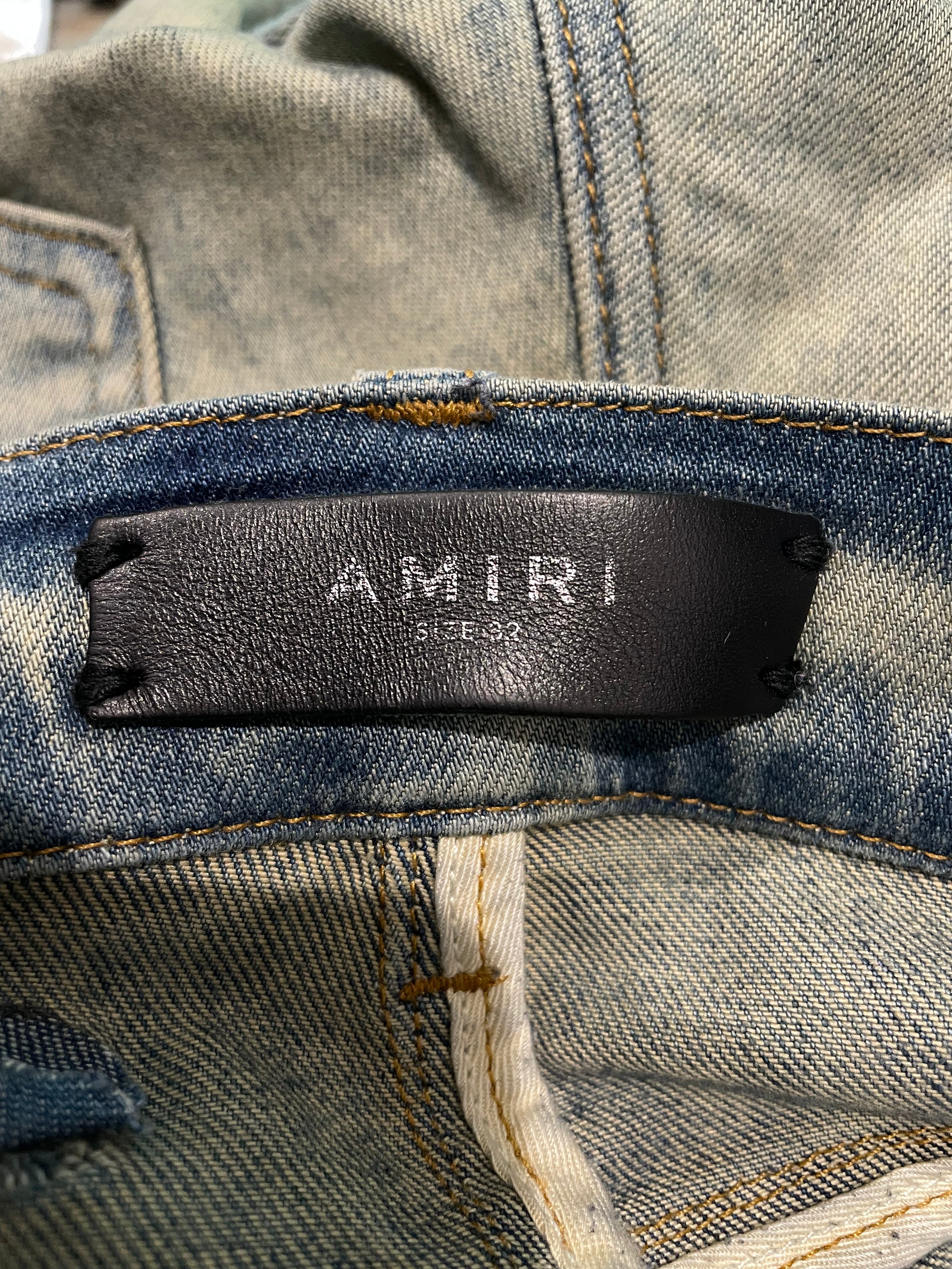 Amiri Knee Rip Vintage Wash Blue Jeans