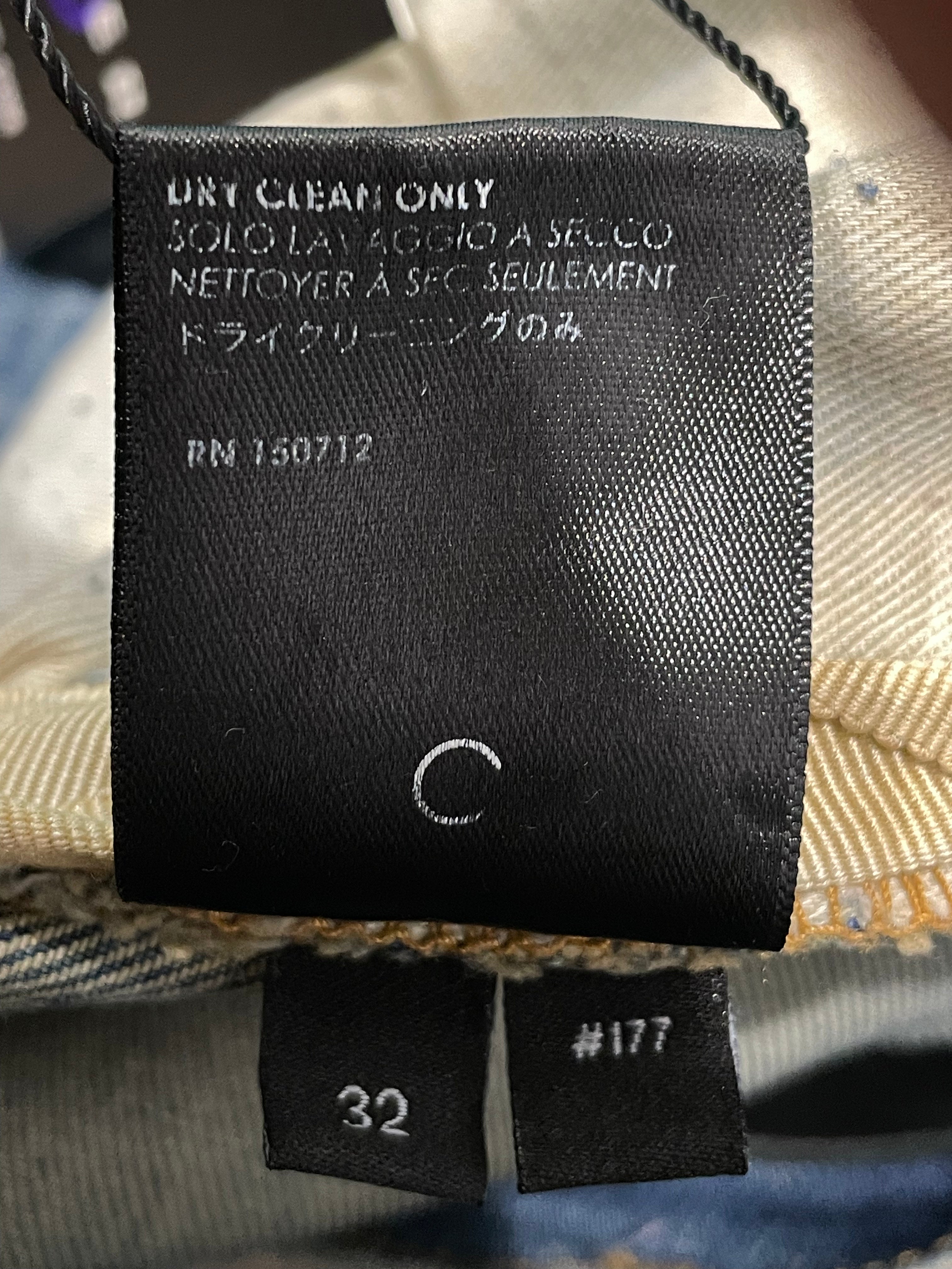 Amiri Knee Rip Vintage Wash Blue Jeans