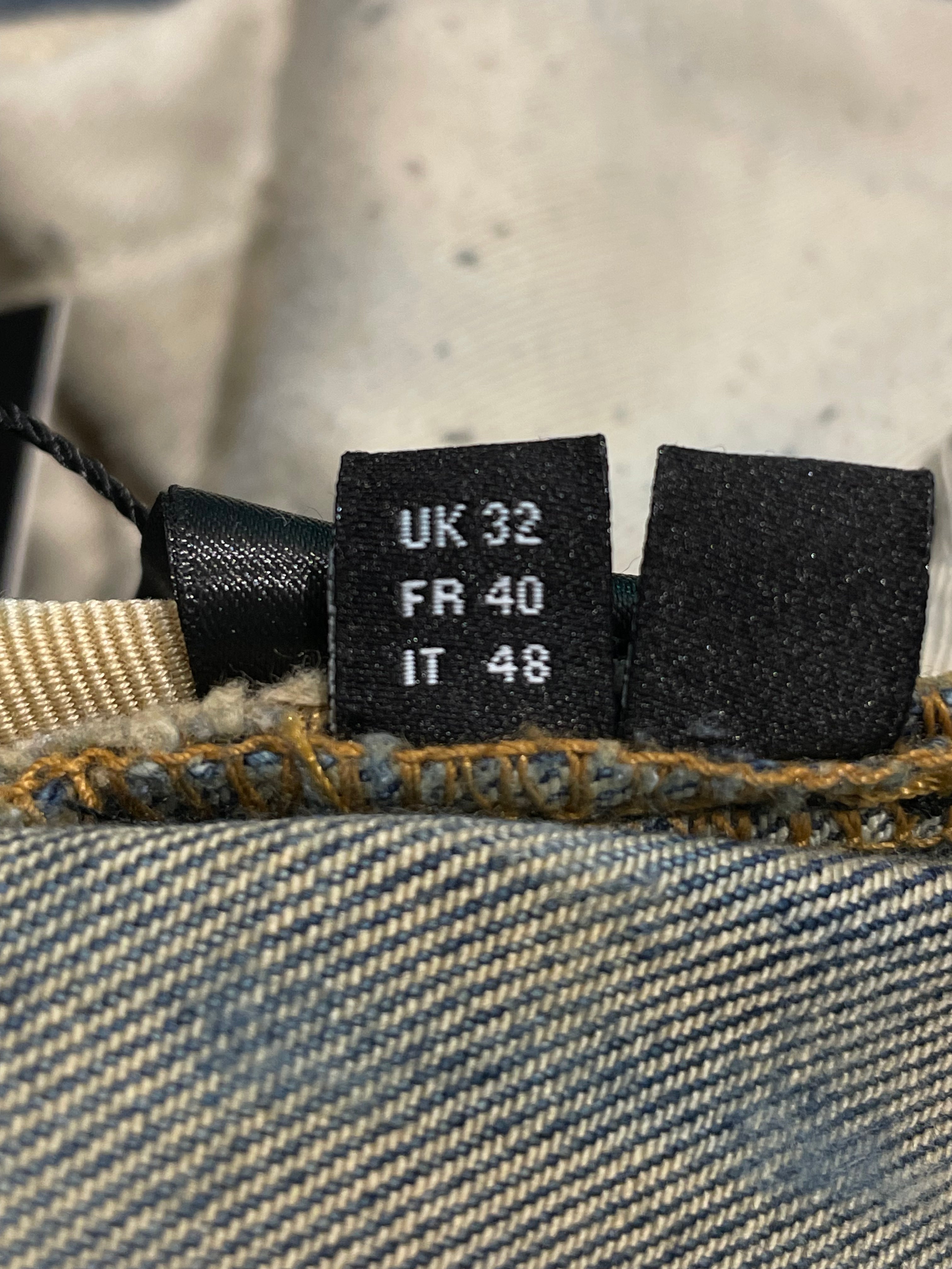 Amiri Knee Rip Vintage Wash Blue Jeans