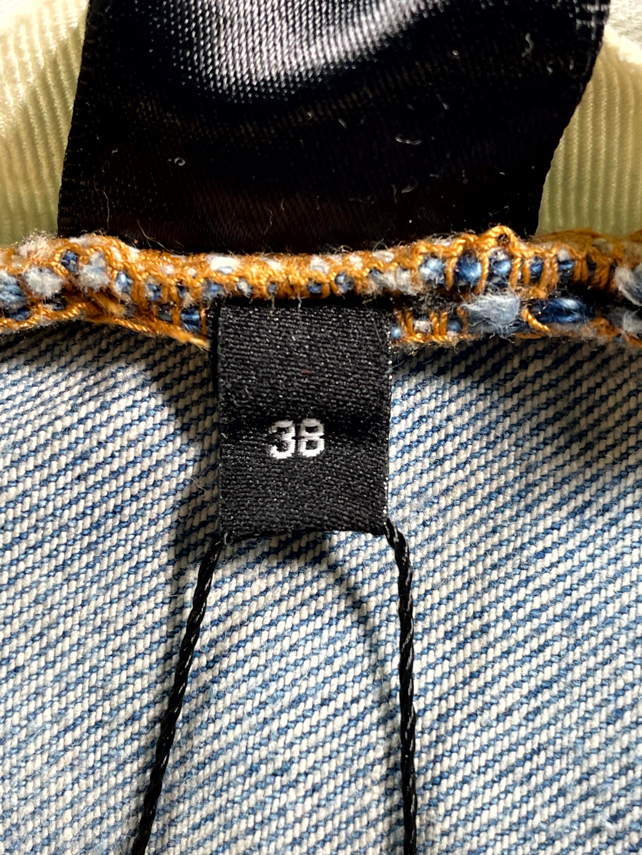 Amiri Mx1 Black Patch Light Wash Jeans