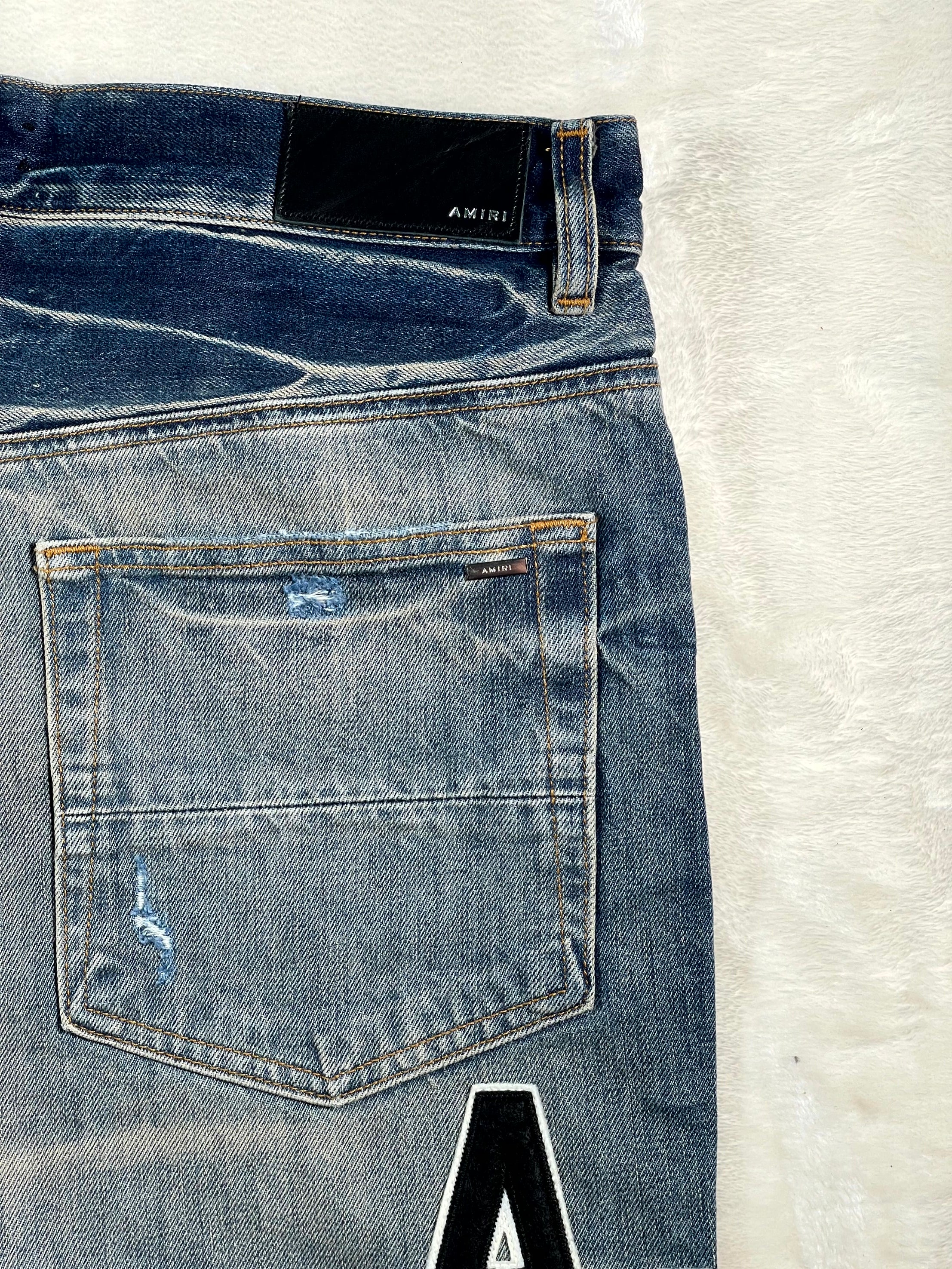 Amiri Vintage Indigo Hockey Logo Straight Leg Light Wash & Grey Jeans