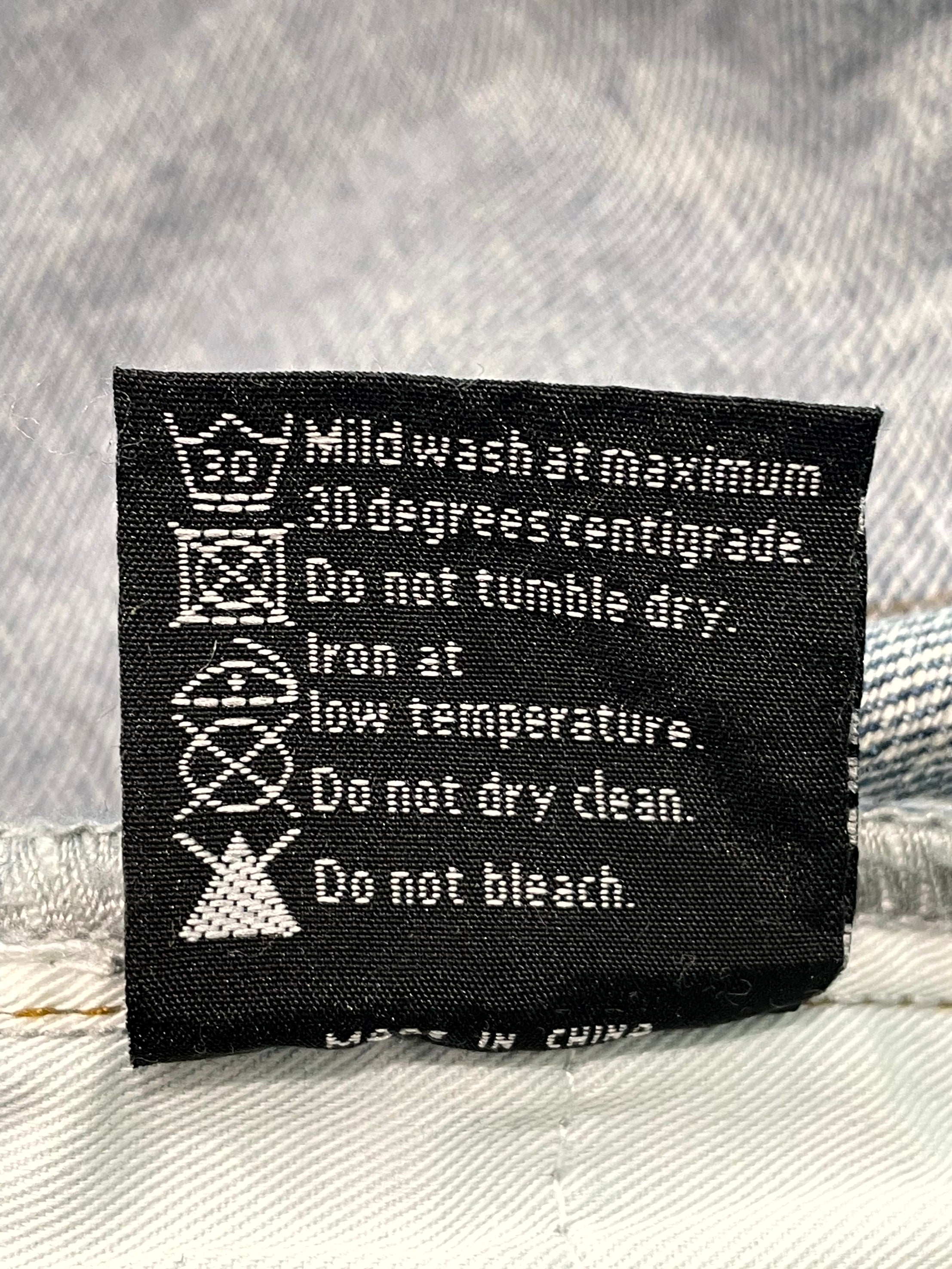 WDW Ultra Flare Scripture Light Wash Denim Jeans