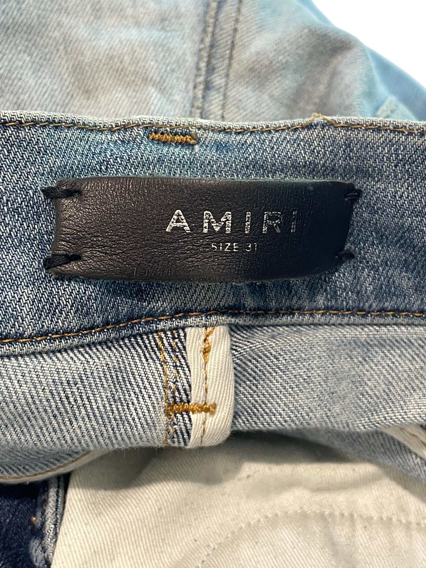 Amiri Mx1 Light Wash Black Patch Jeans