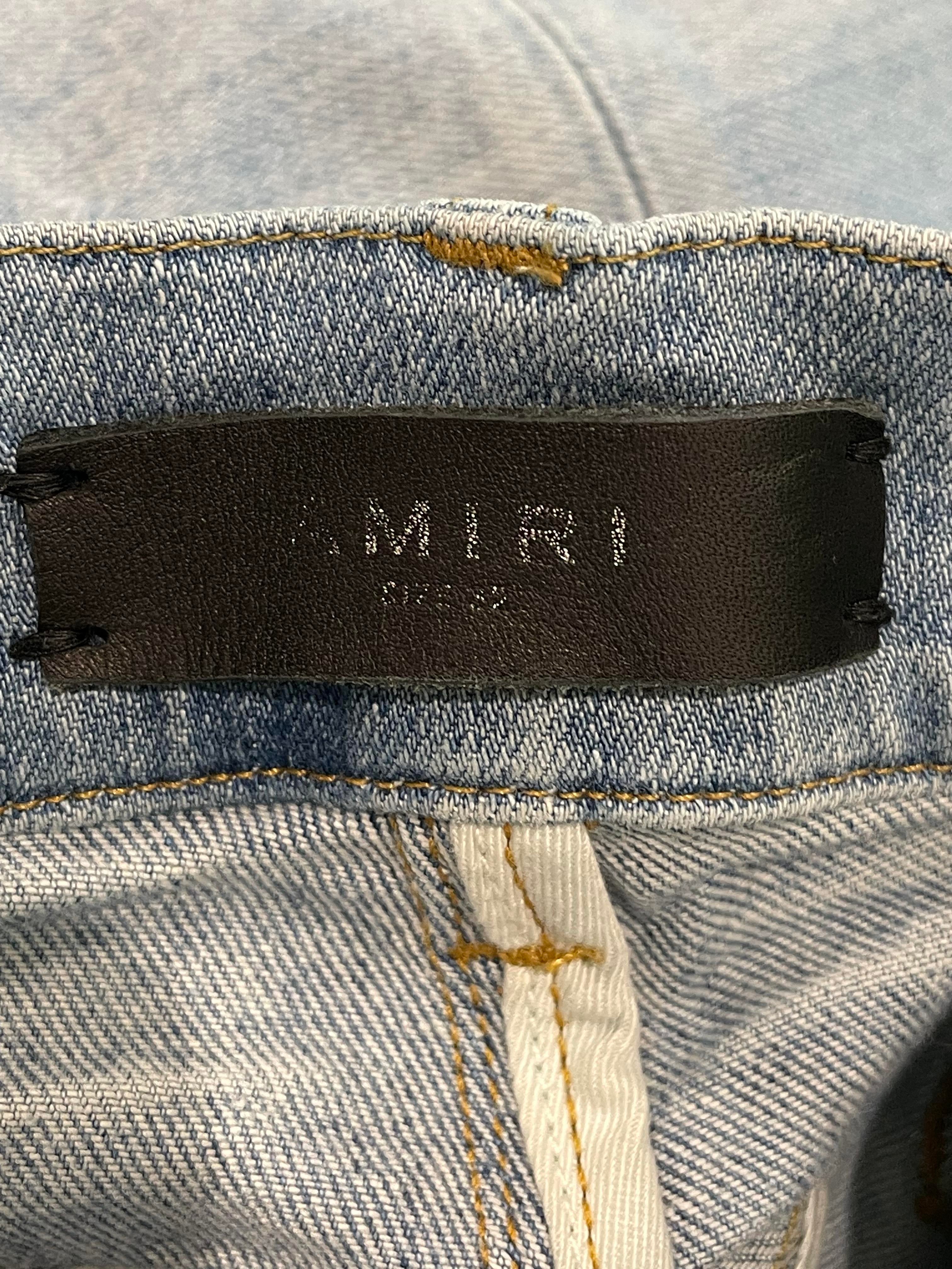 Amiri Side Logo Paint Drip Light Wash Jeans
