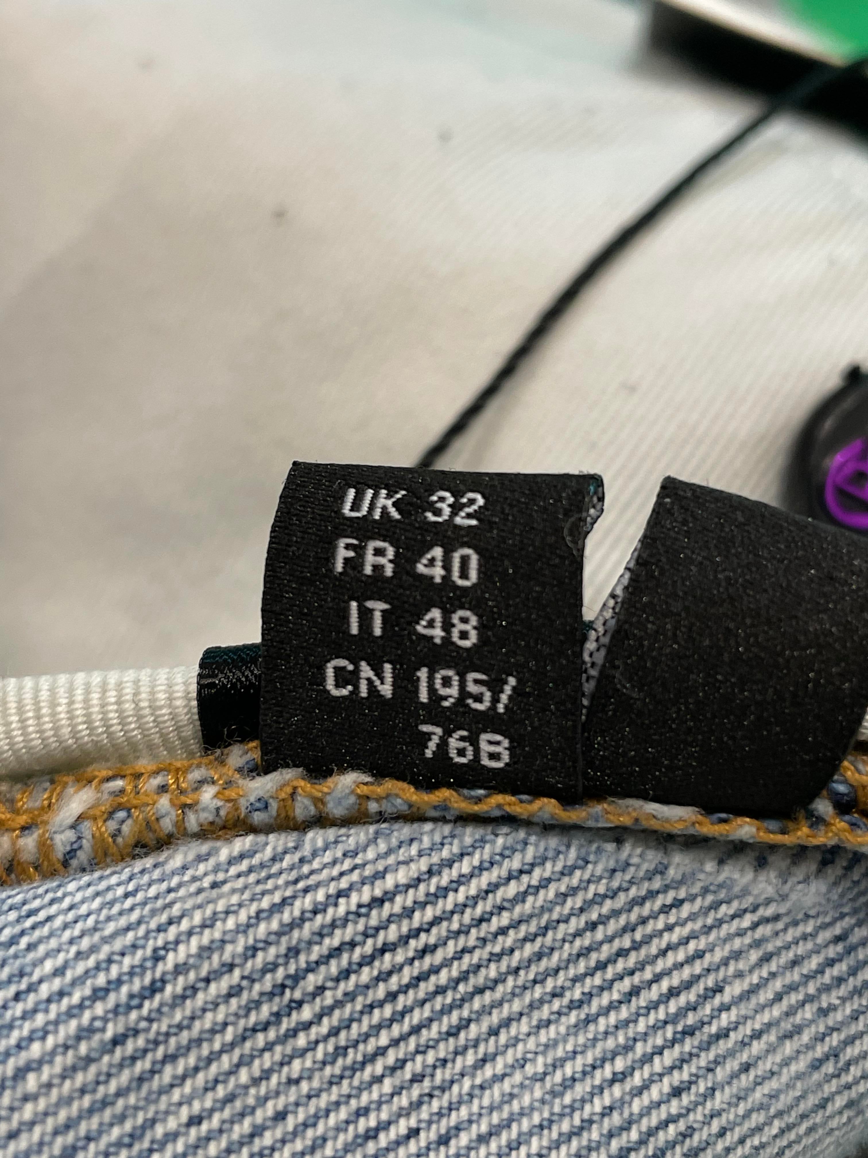 Amiri Side Logo Paint Drip Light Wash Jeans