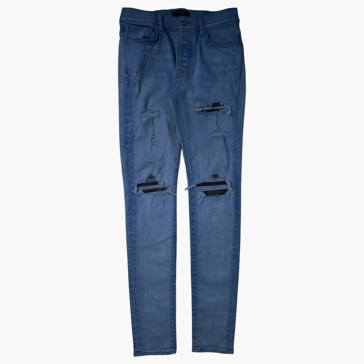 Amiri MX1 Camo Patch Light Wash Jeans