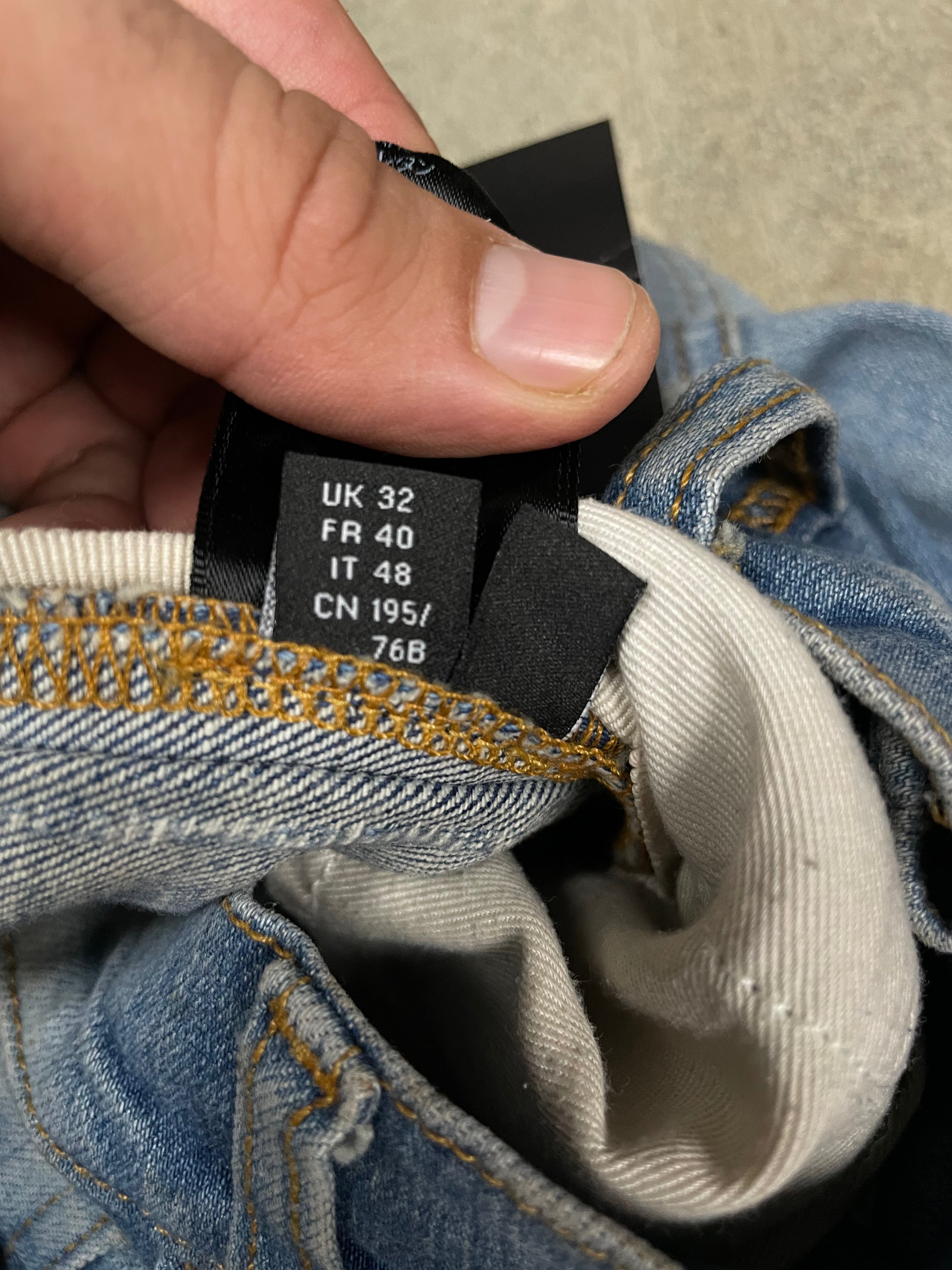 Amiri Floral Thrasher Cream Light Wash Jeans