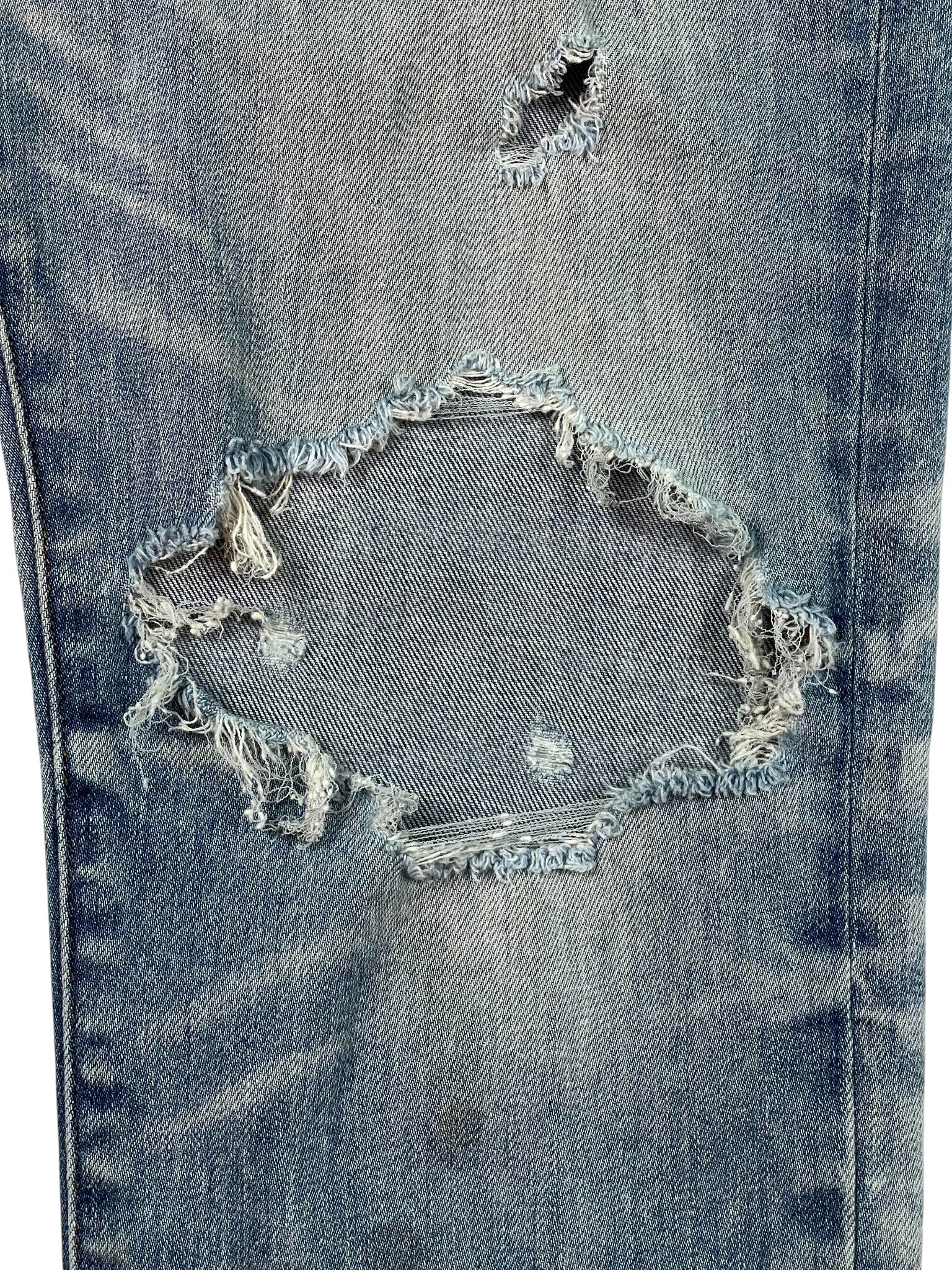 Amiri Light Wash Thrasher Ripped Jeans