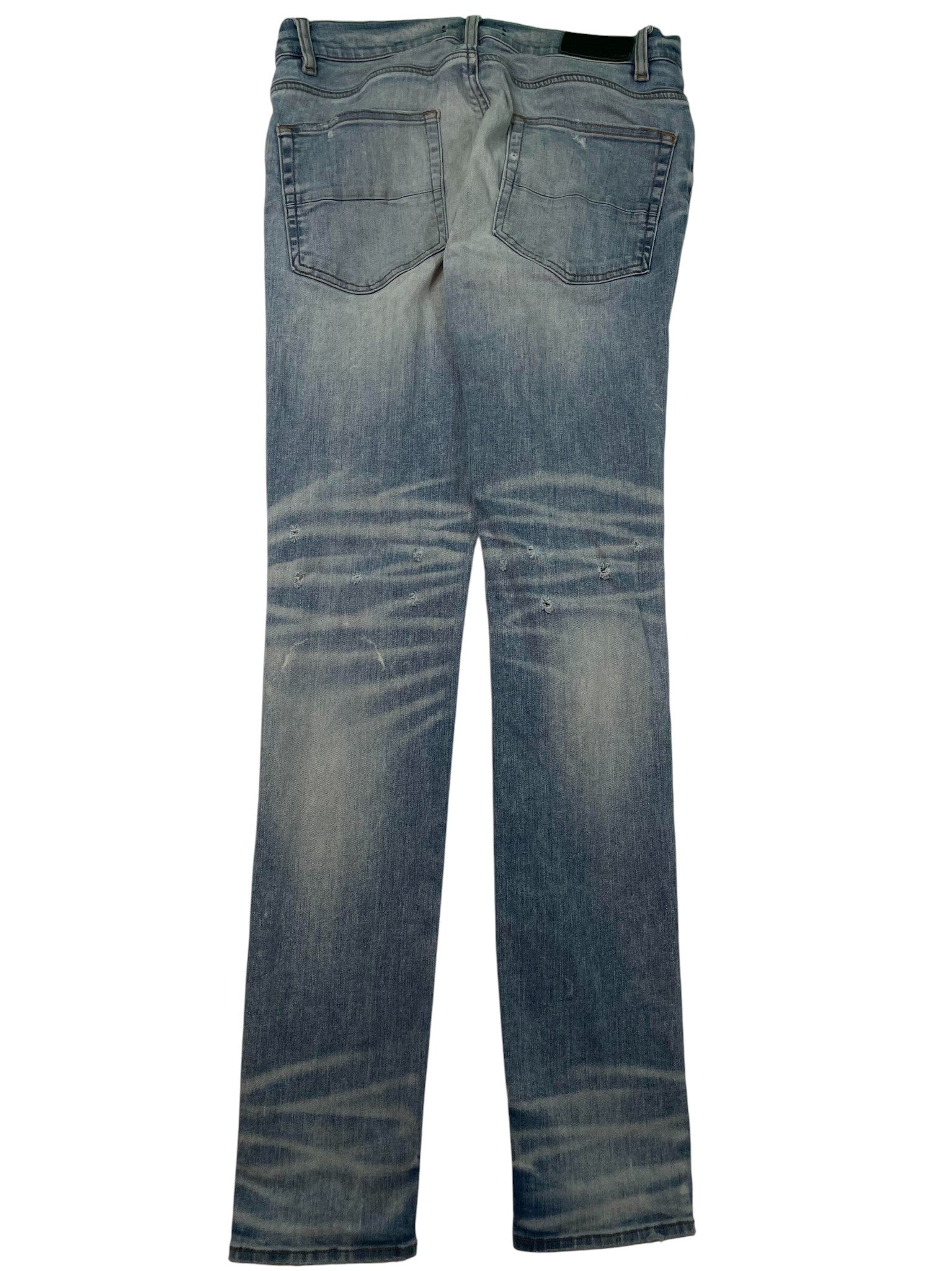 Amiri Light Wash Thrasher Ripped Jeans