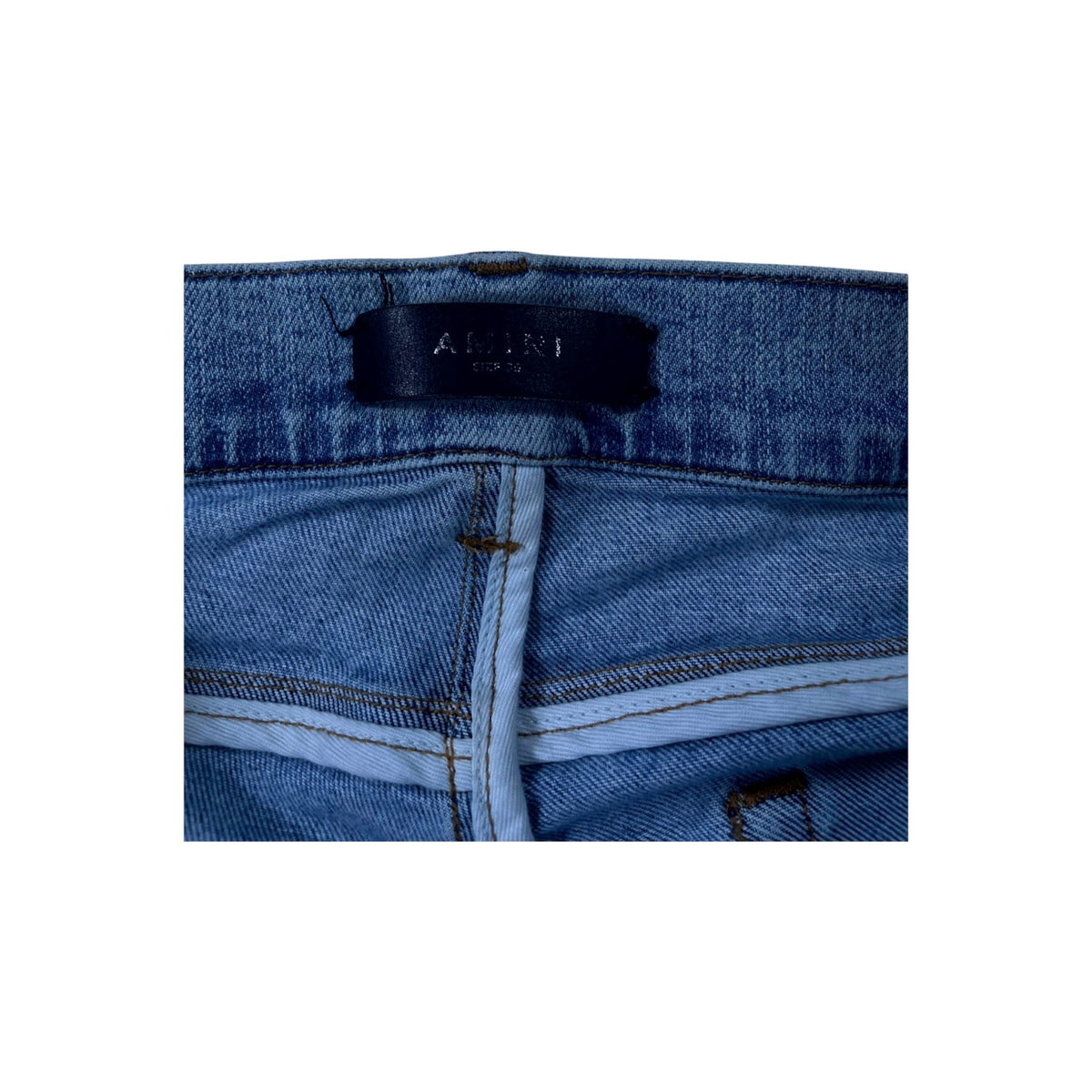 Amiri "MX1" Iridescent Patch Light Wash Jeans