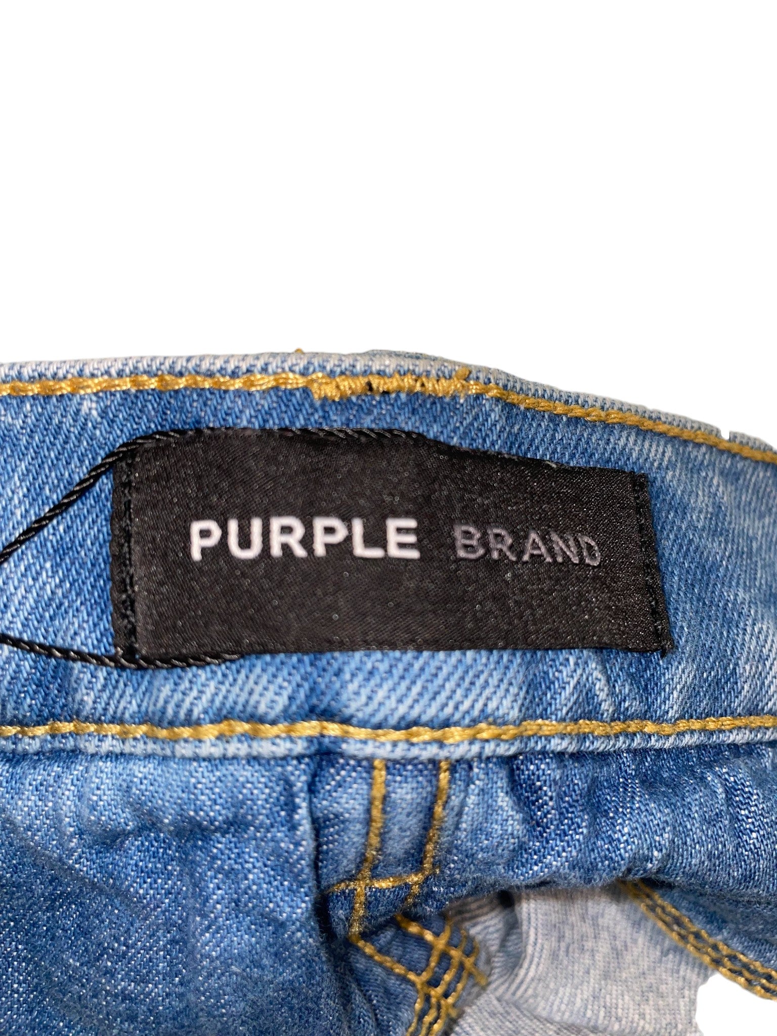 Purple Brand Light Wash Ripped Jeans