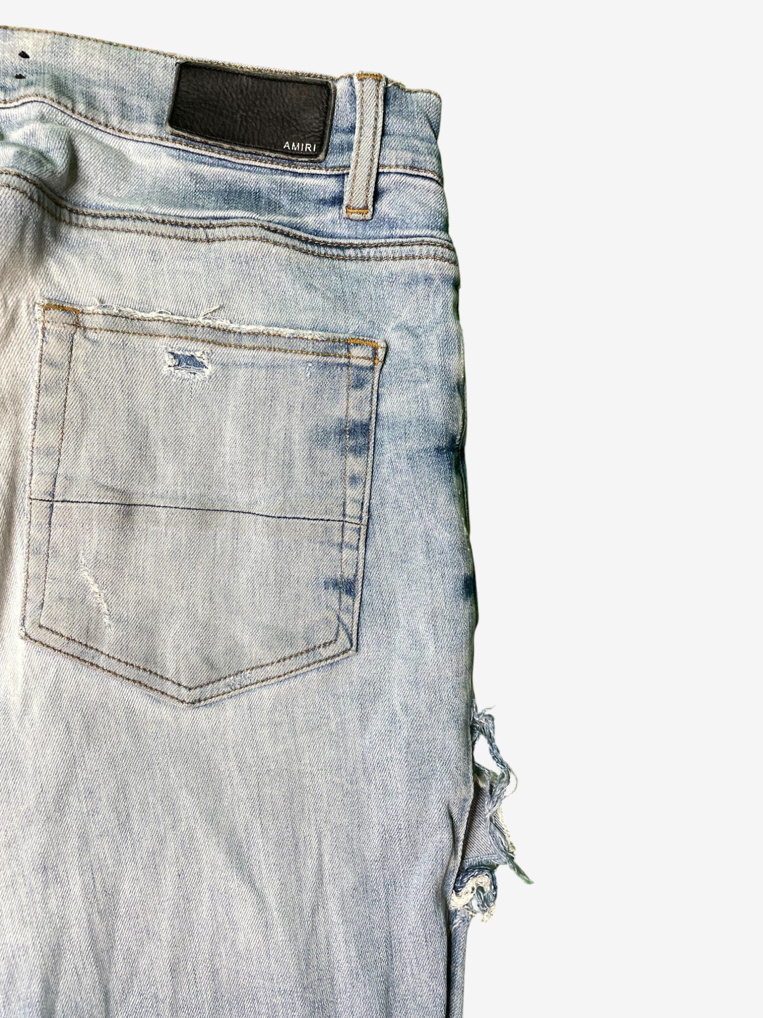Amiri Thrasher Ripped Light Wash Blue Jeans