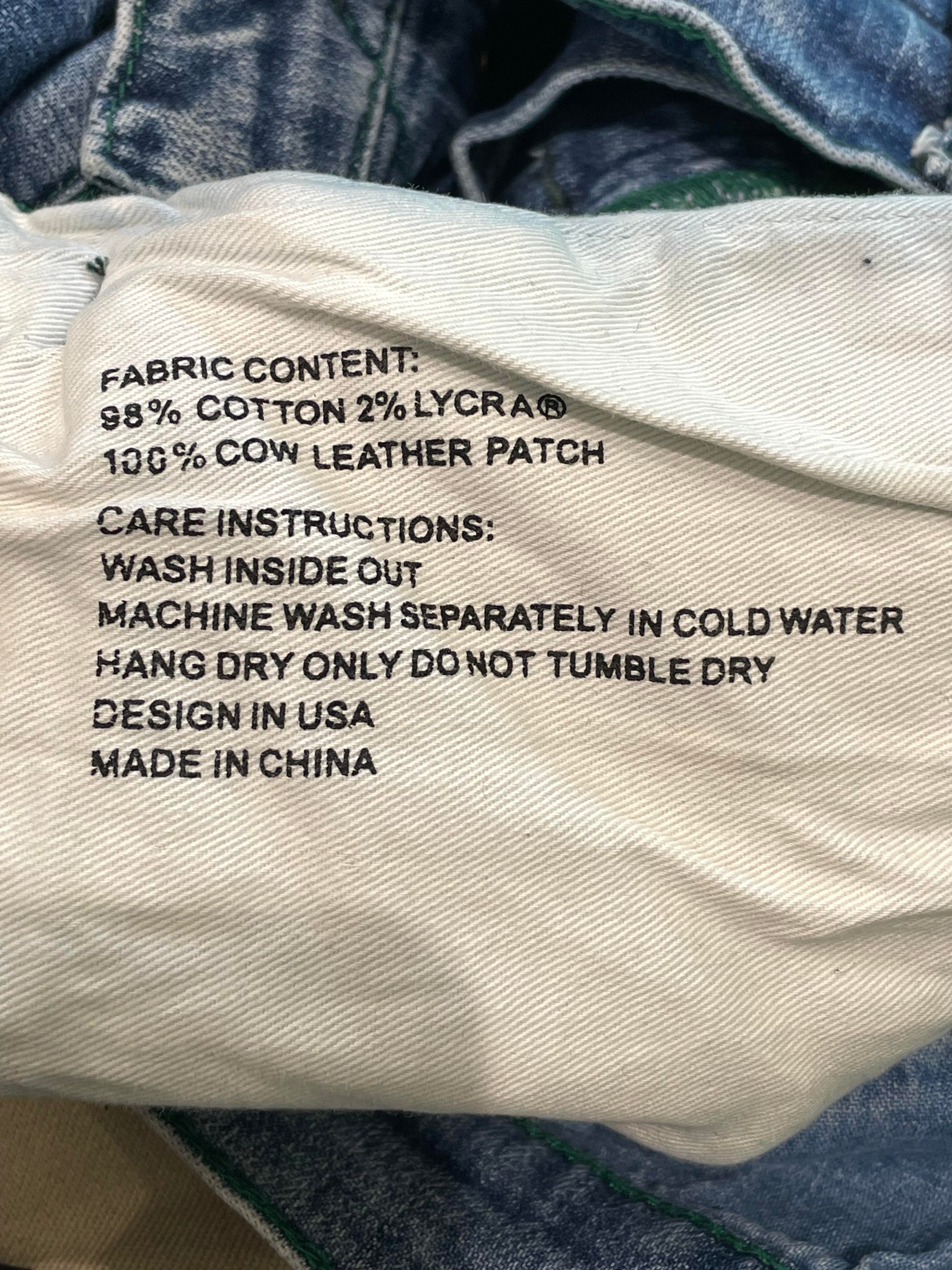 Purple Brand Paint Splatter Light Wash Blue Jeans