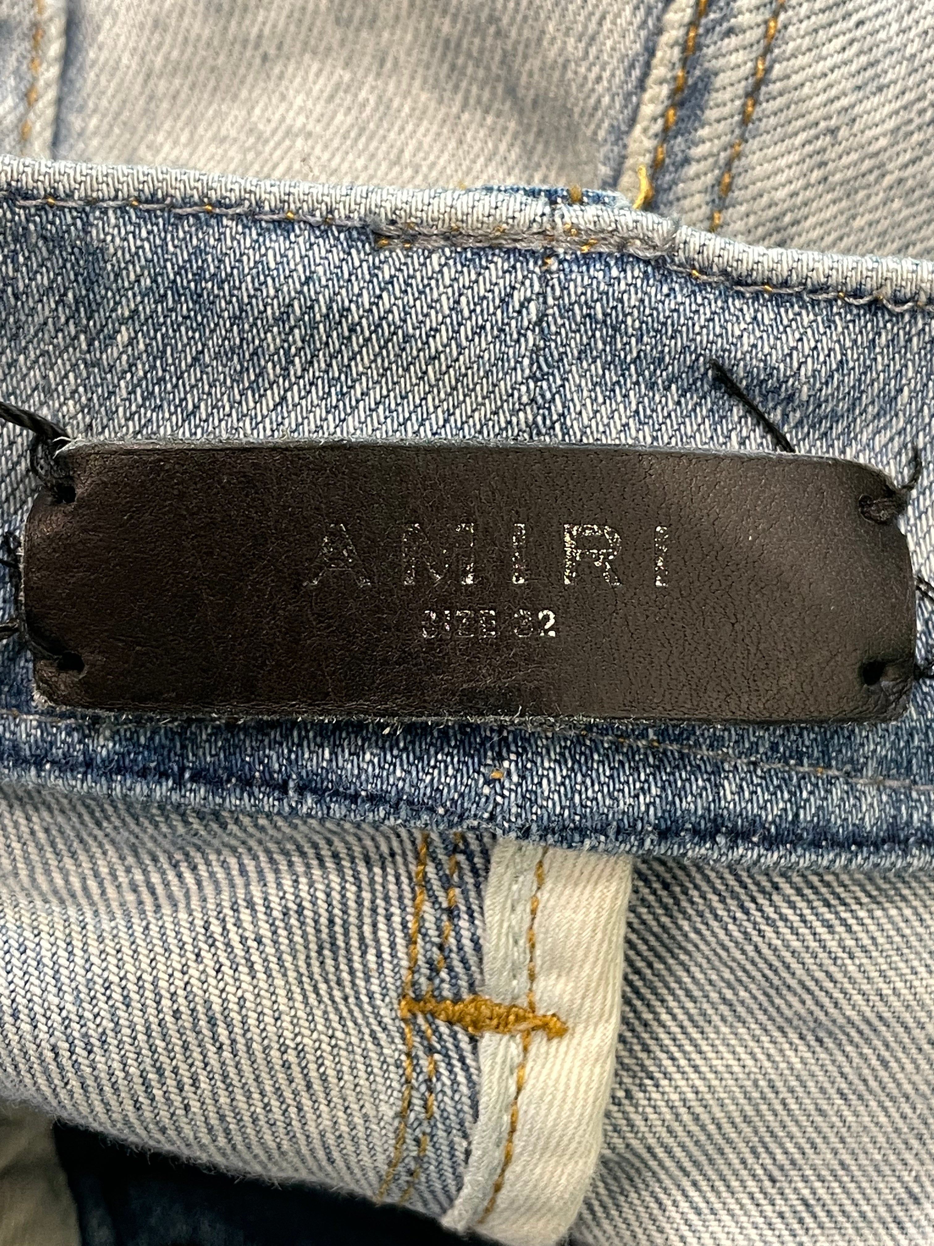 Amiri MX1 Light Wash Playboy Pale Blue Patch Jeans