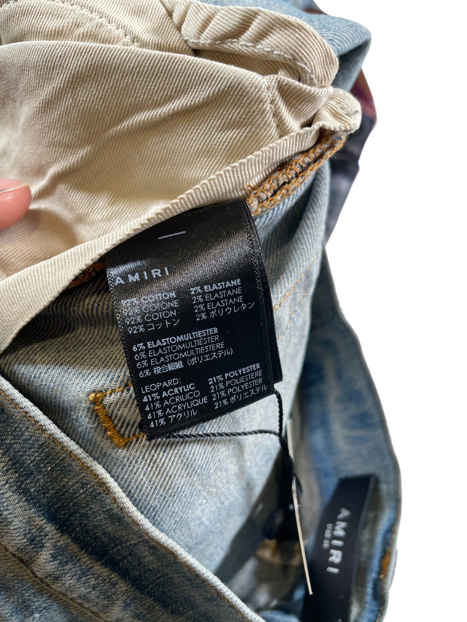 Amiri Grunge Patchwork Light Wash Jeans