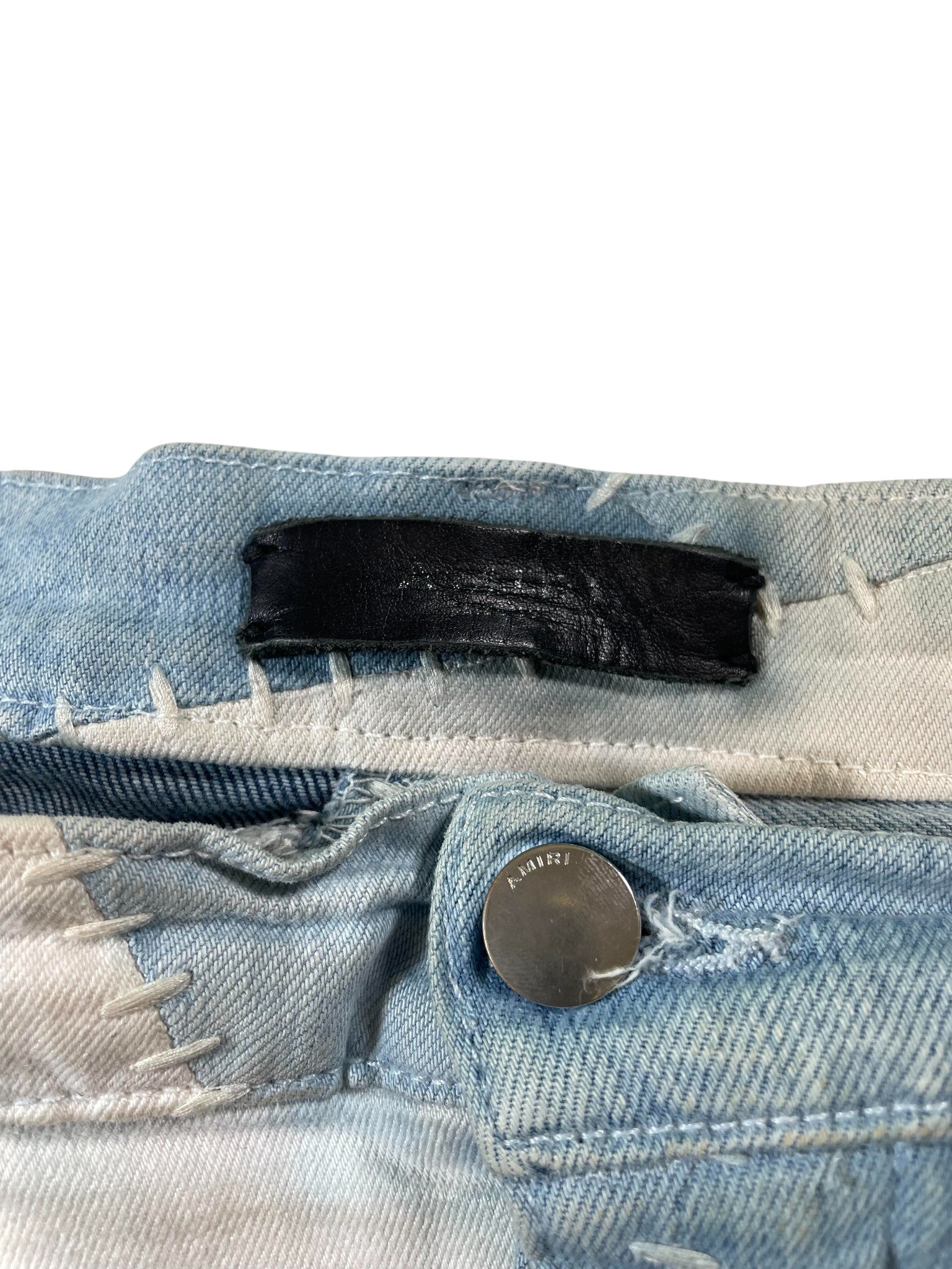 Amiri Light Wash Patchwork Jeans