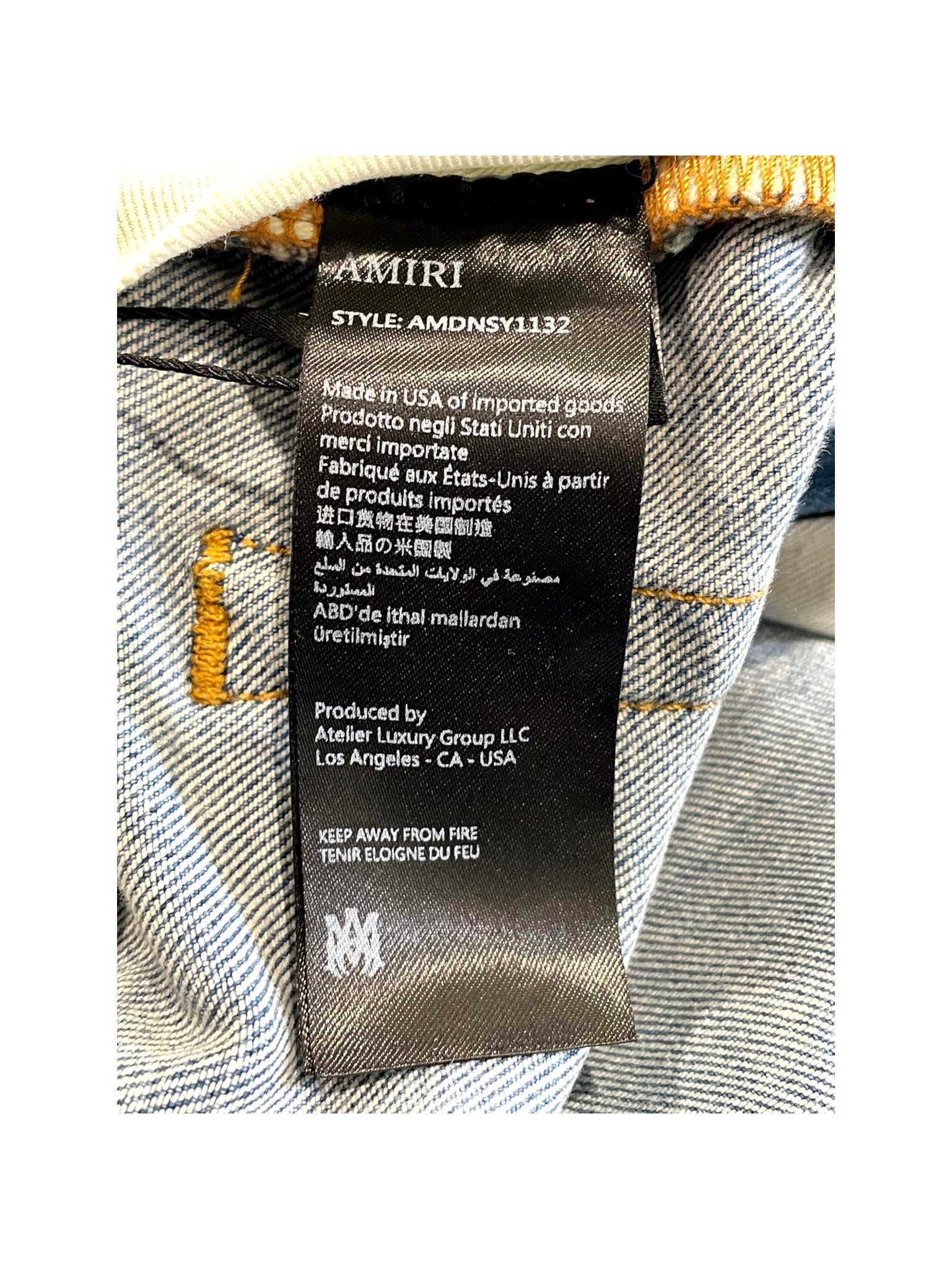 Amiri "Bone Embossed" Light Wash Jeans