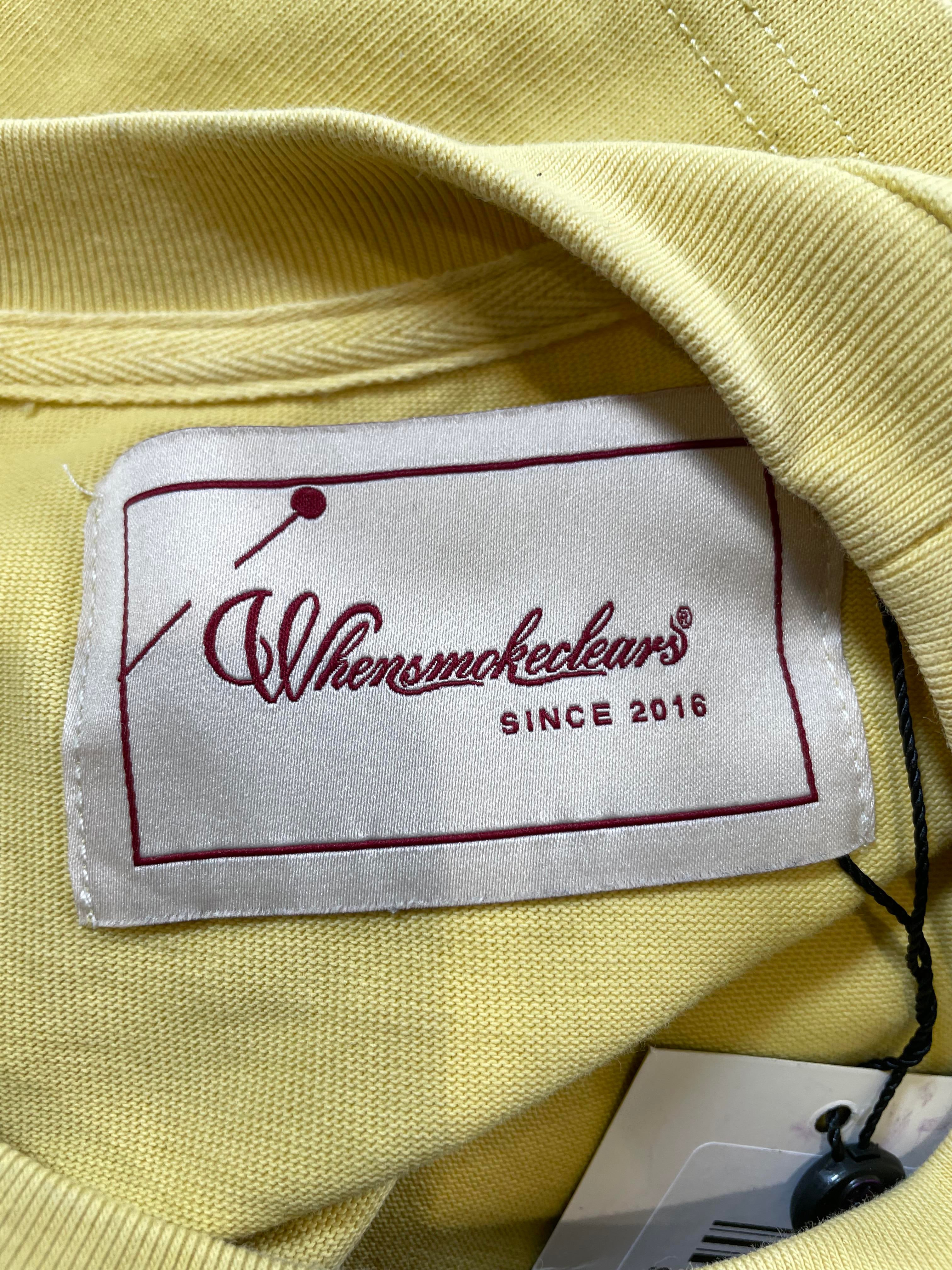When Smoke Clears Yellow Chest Logo Tee