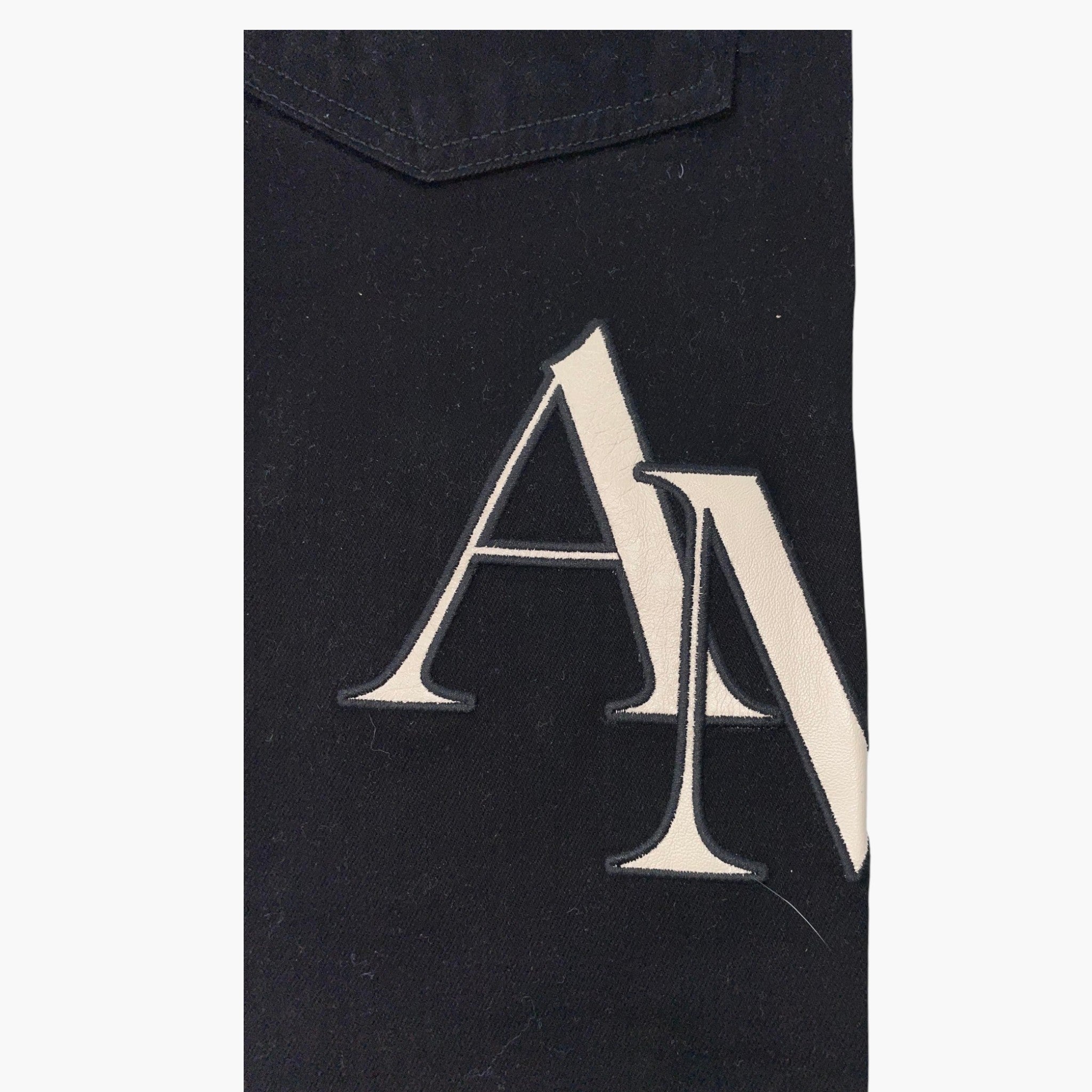 Amiri Logo Cream Staggered Side Black Jeans