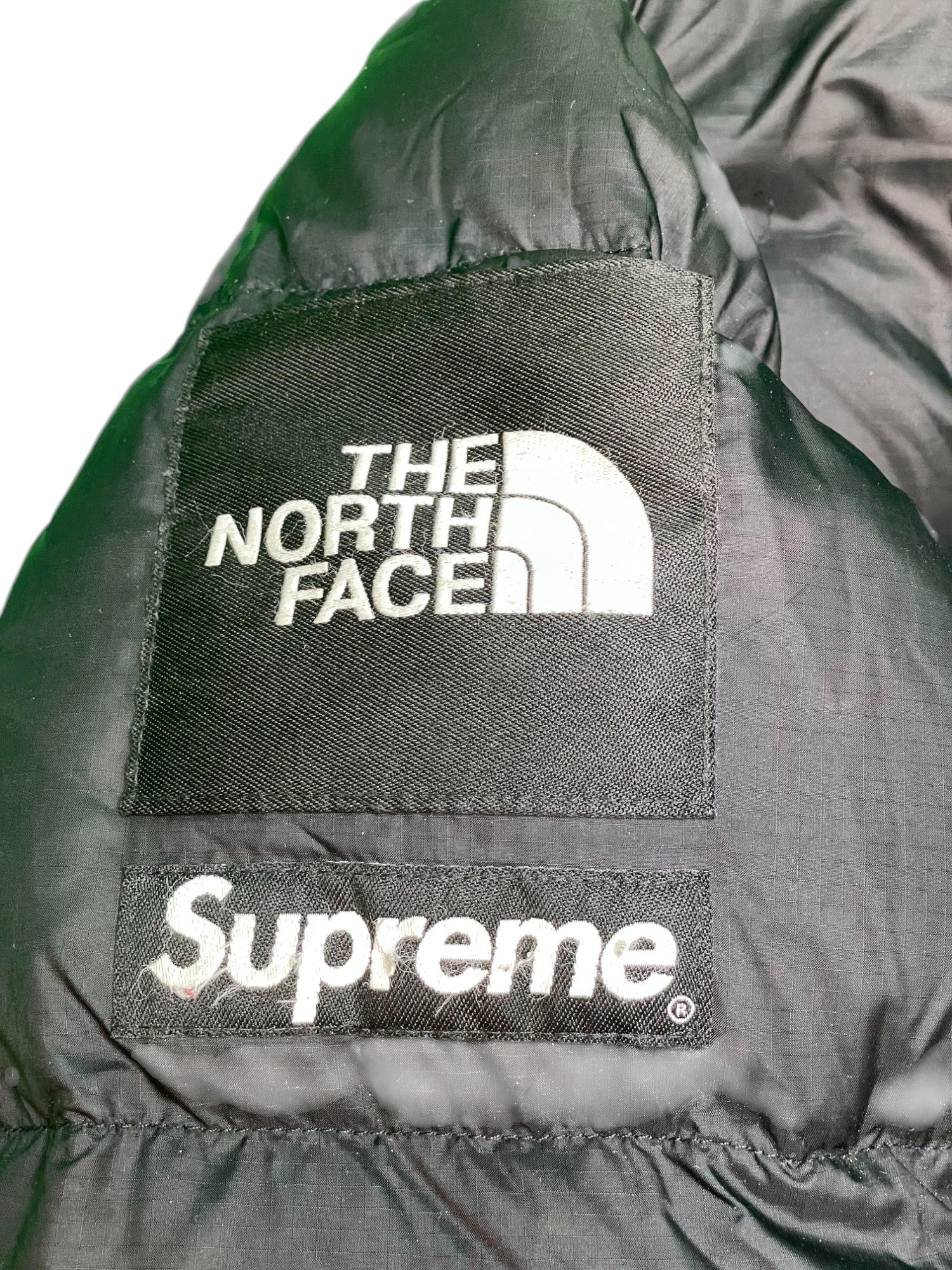 Supreme x The North Face Black Puffer Coat