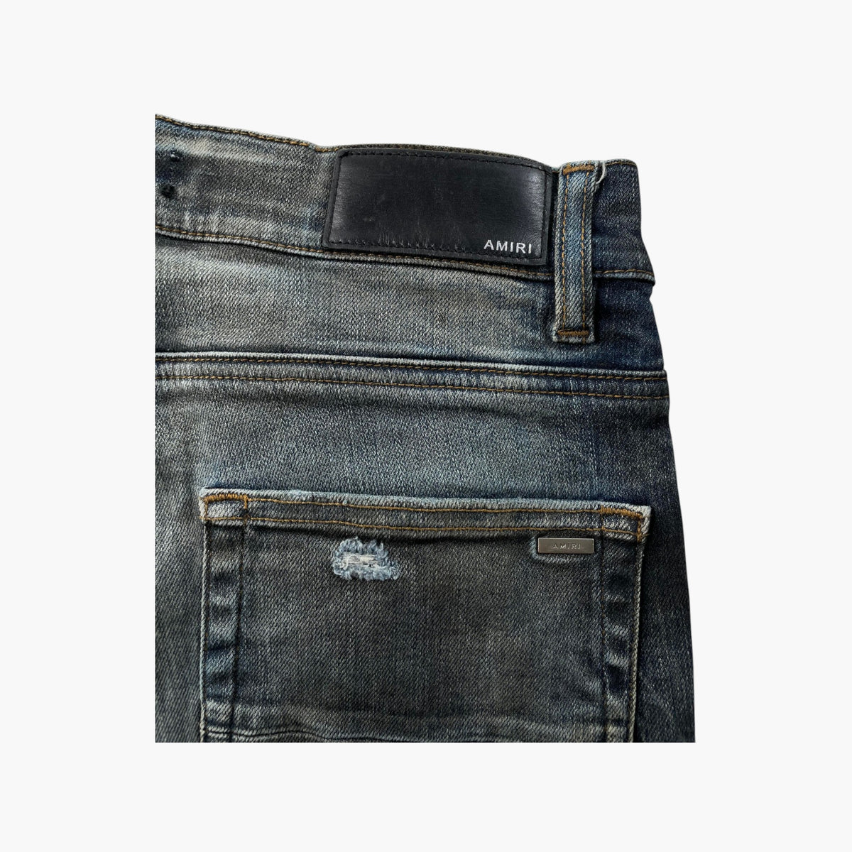 Amiri Studded Thrasher Rust Indigo Jeans