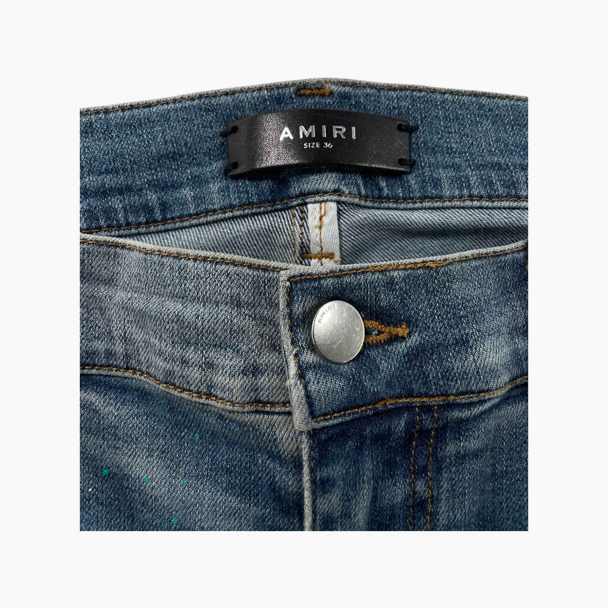 Amiri Teal Splatter Ripped Light Wash Jeans