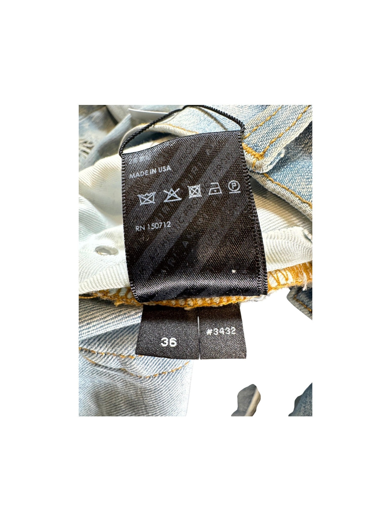 Amiri MX1 Camo Patch Light Wash Jeans