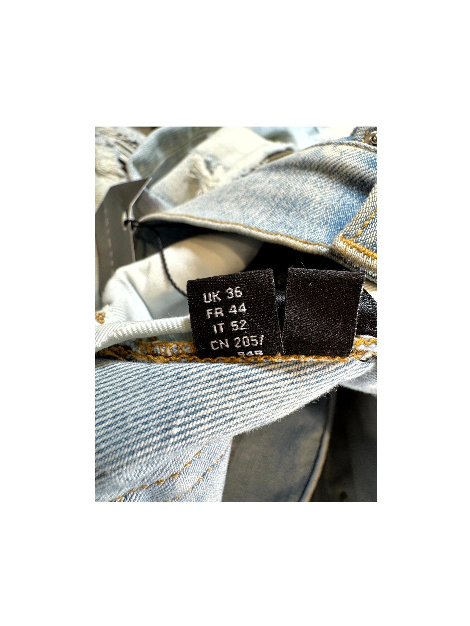 Amiri MX1 Camo Patch Light Wash Jeans