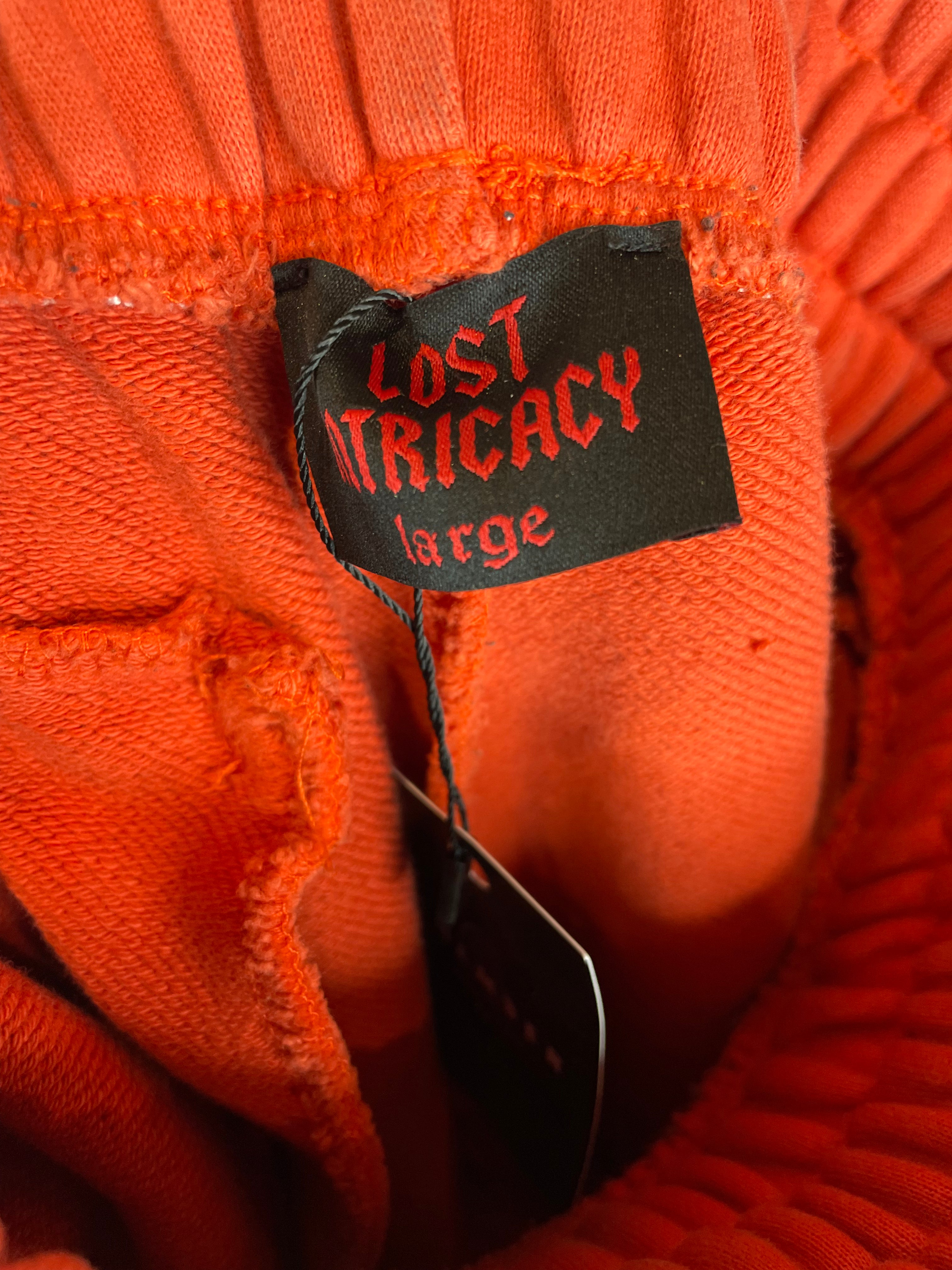 LOST INTRICACY Solar Red Sweatpants