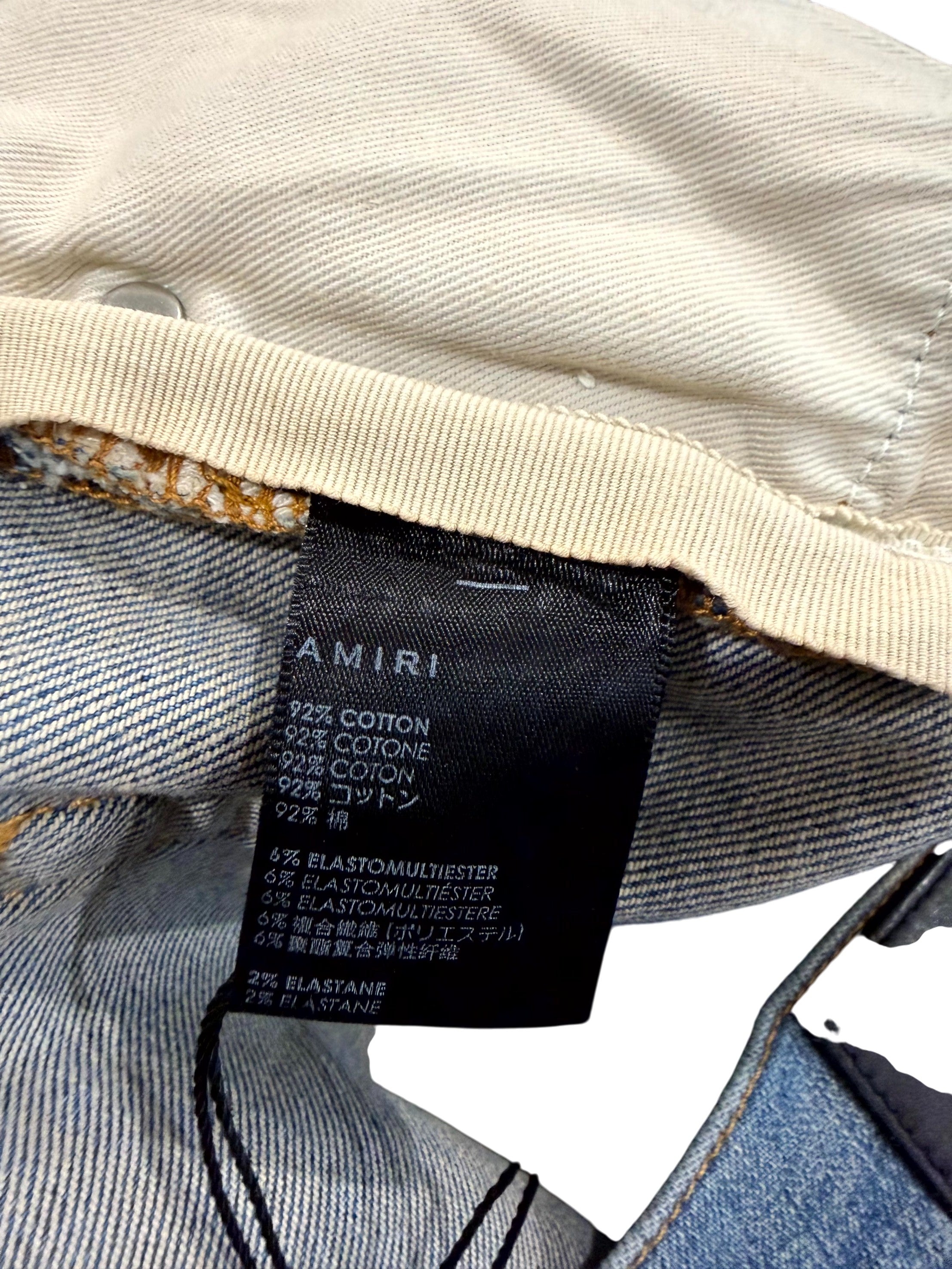 Amiri MX1 Paint Splatter Light Wash Jeans