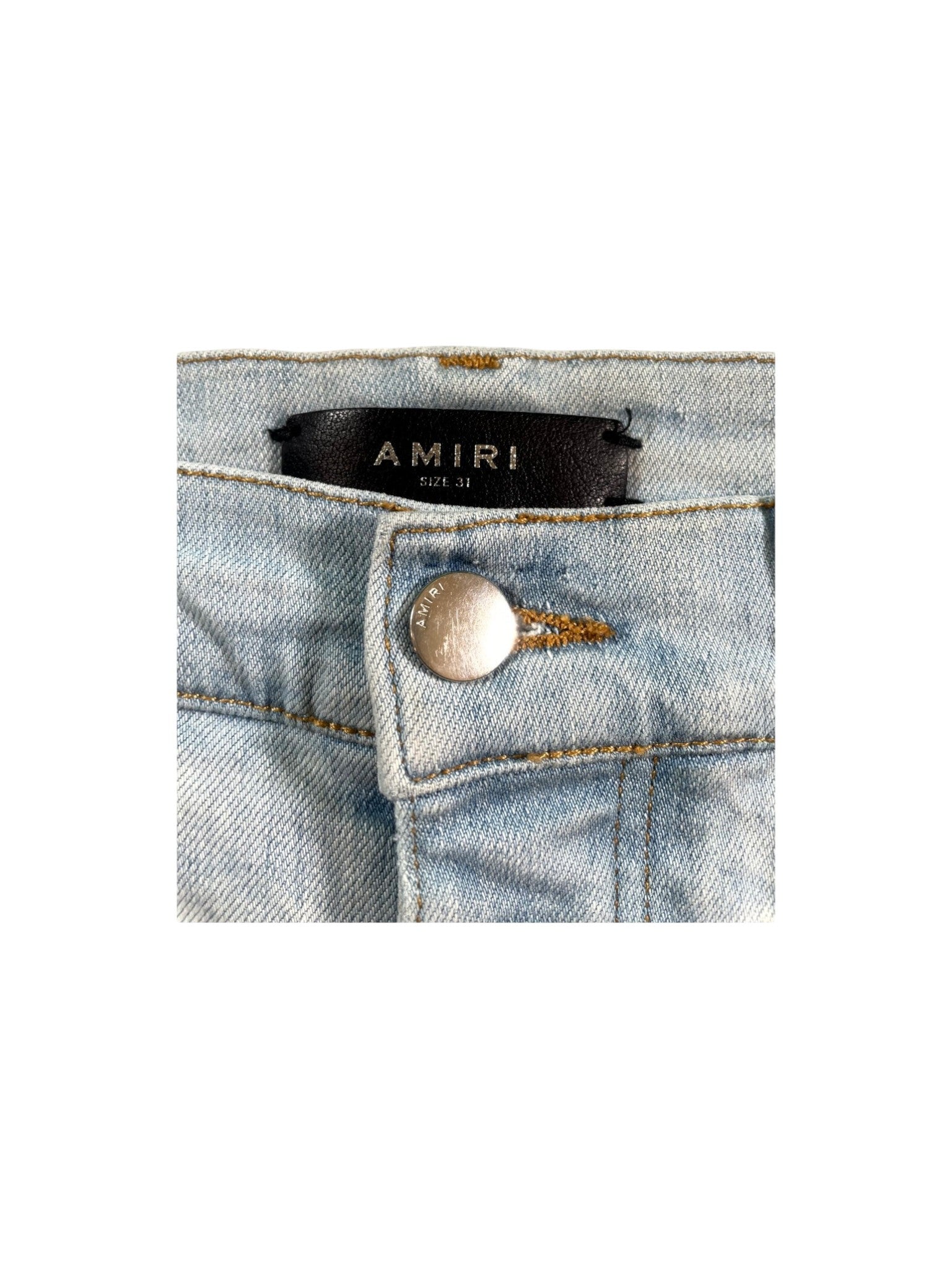 Amiri Ripped Light Wash Jeans