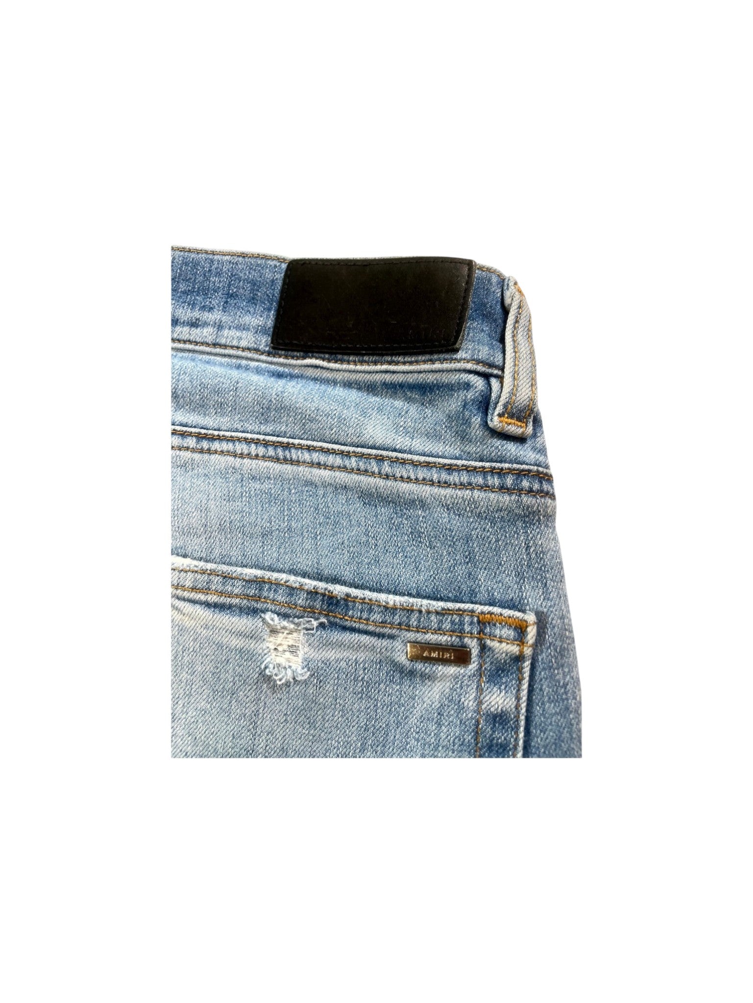 Amiri Rip Light Wash Jeans