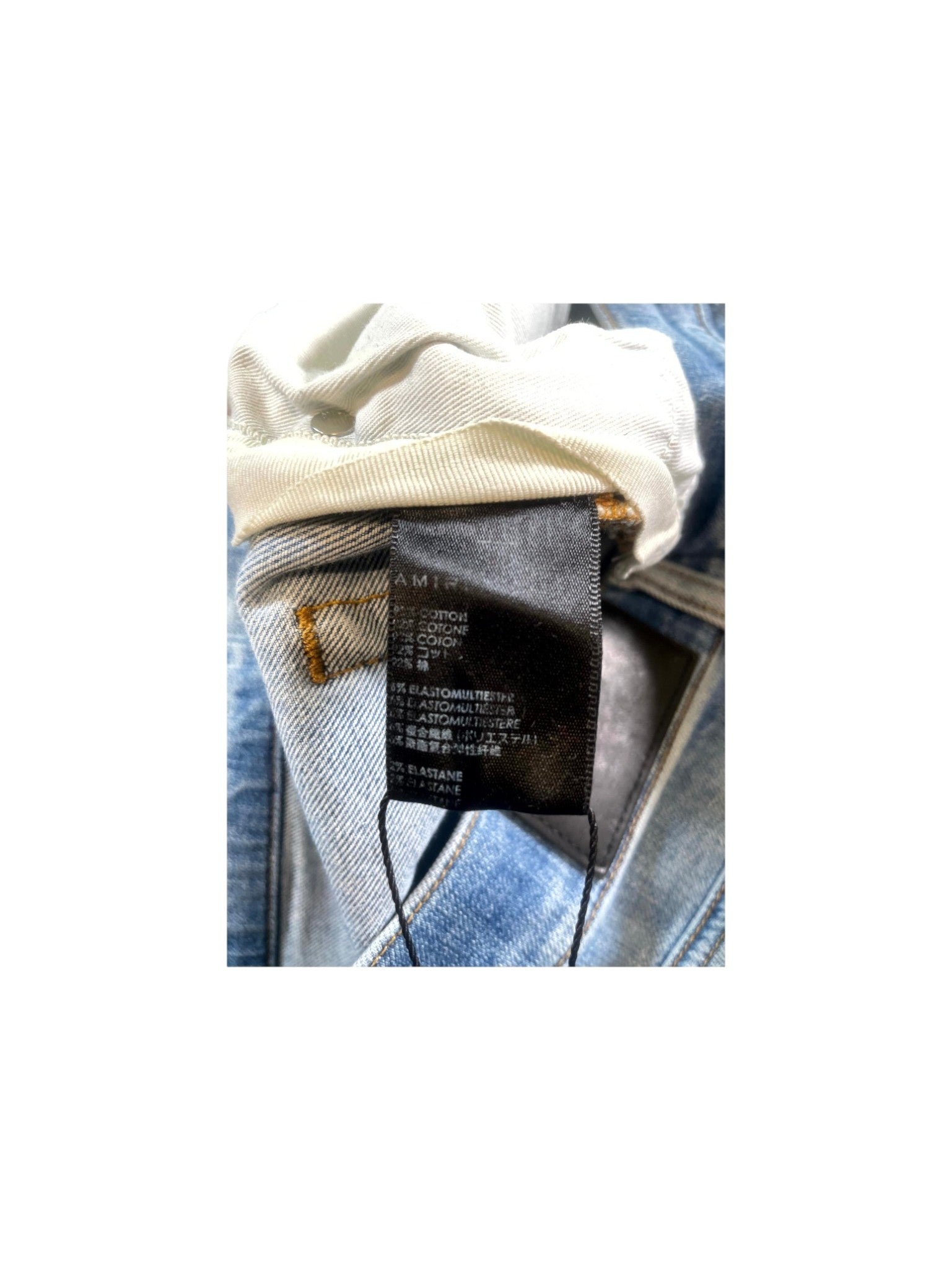 Amiri Rip Light Wash Jeans