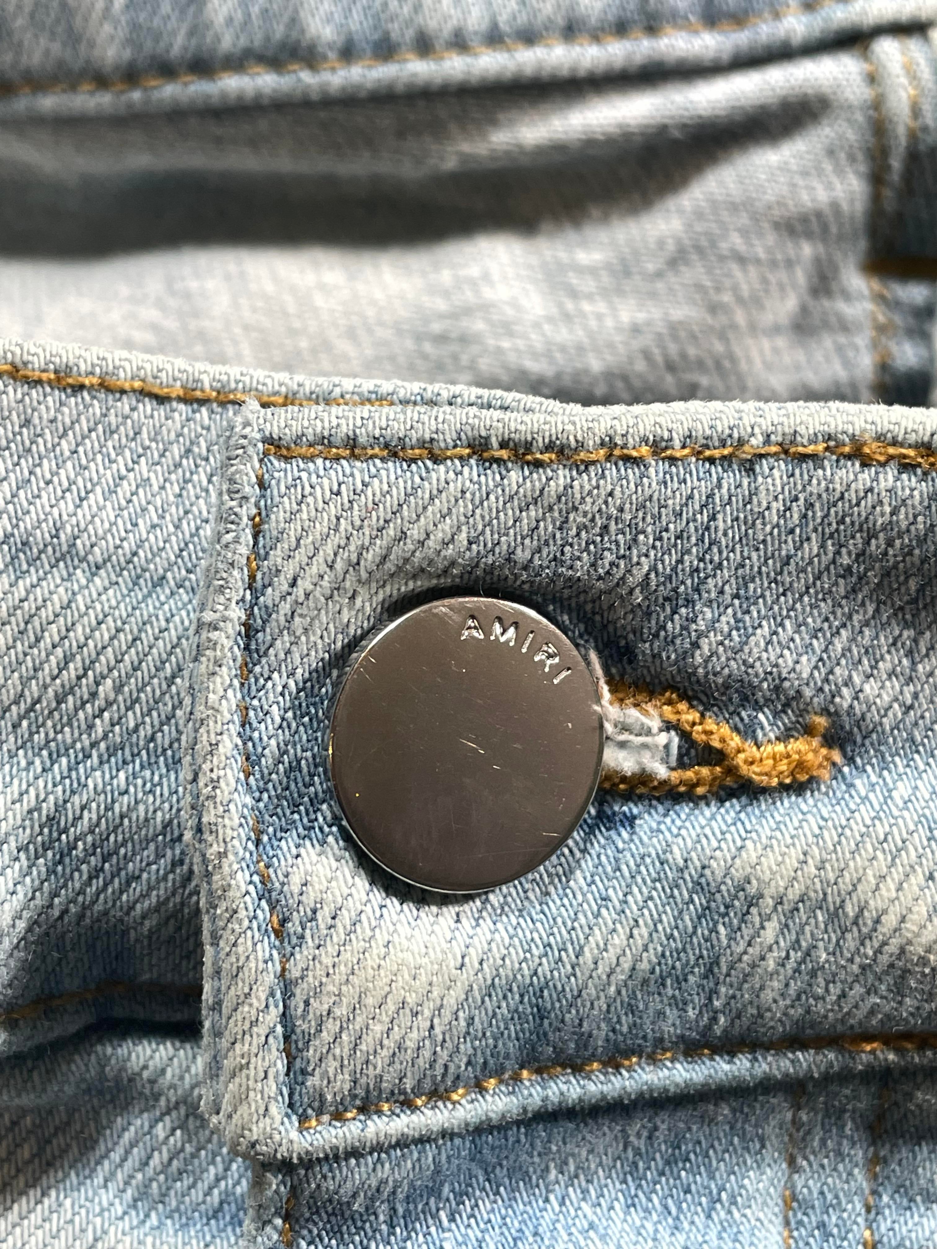 Amiri MX1 Camo Patch Light Wash Jeans